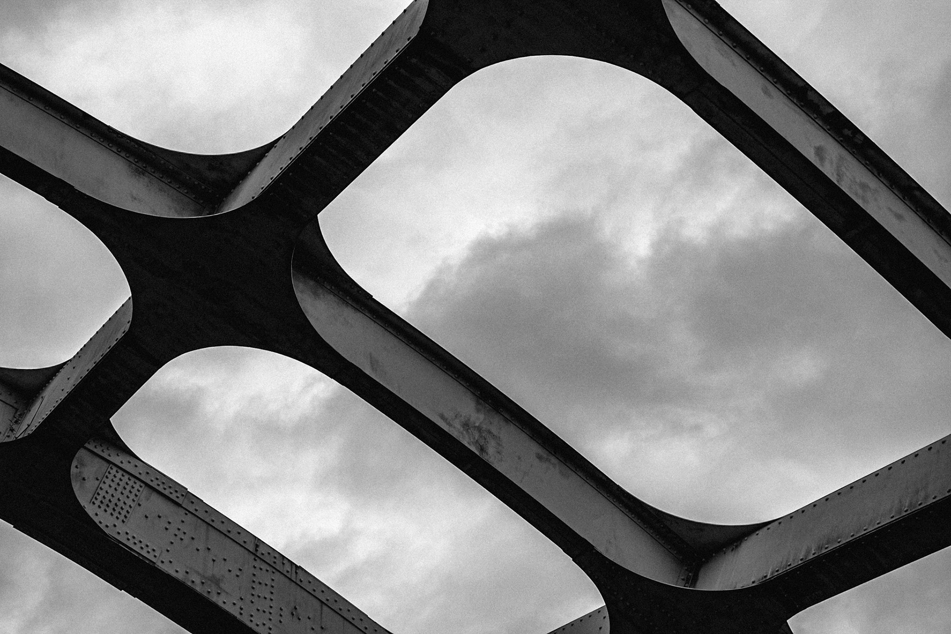 (Mostly) Bicycling America XXIV. Edmond Pettus Bridge, Selma, Alabama, December, 2018. The structure calls to mind linked arms or hands to me. Unity. One can't travel through the south, the deep south particularly, without thinking on the Civil Rights Movement. Obviously when I crossed the bridge on my bike at the end of 2018 things were, at least superficially, different than they are currently. I say superficially because underneath the quiet exterior there was anger and resentment stirring, waiting for a trigger to set it off, and rightfully so I might add. According to Wikipedia the bridge is named after a Confederate general, who also happened to be a U.S. Senator and head of the Alabama chapter of the KKK. I did not know this. I did however know that it was the sight of a number of confrontations between unarmed demonstrators and state police, all of which resulted in the police attacking the demonstrators, most notably on what's come to be known as Bloody Sunday, on March 7, 1965, when the demonstrators planned to march from Selma to the state capital, Montgomery, some 50 miles away. This was captured by news cameras and newspaper reporters and led to the Voting Rights Act. It wasn't until March 21 that demonstrators were able to peacably march the distance over the course of four days to Montgomery, protected by National Guardsman.