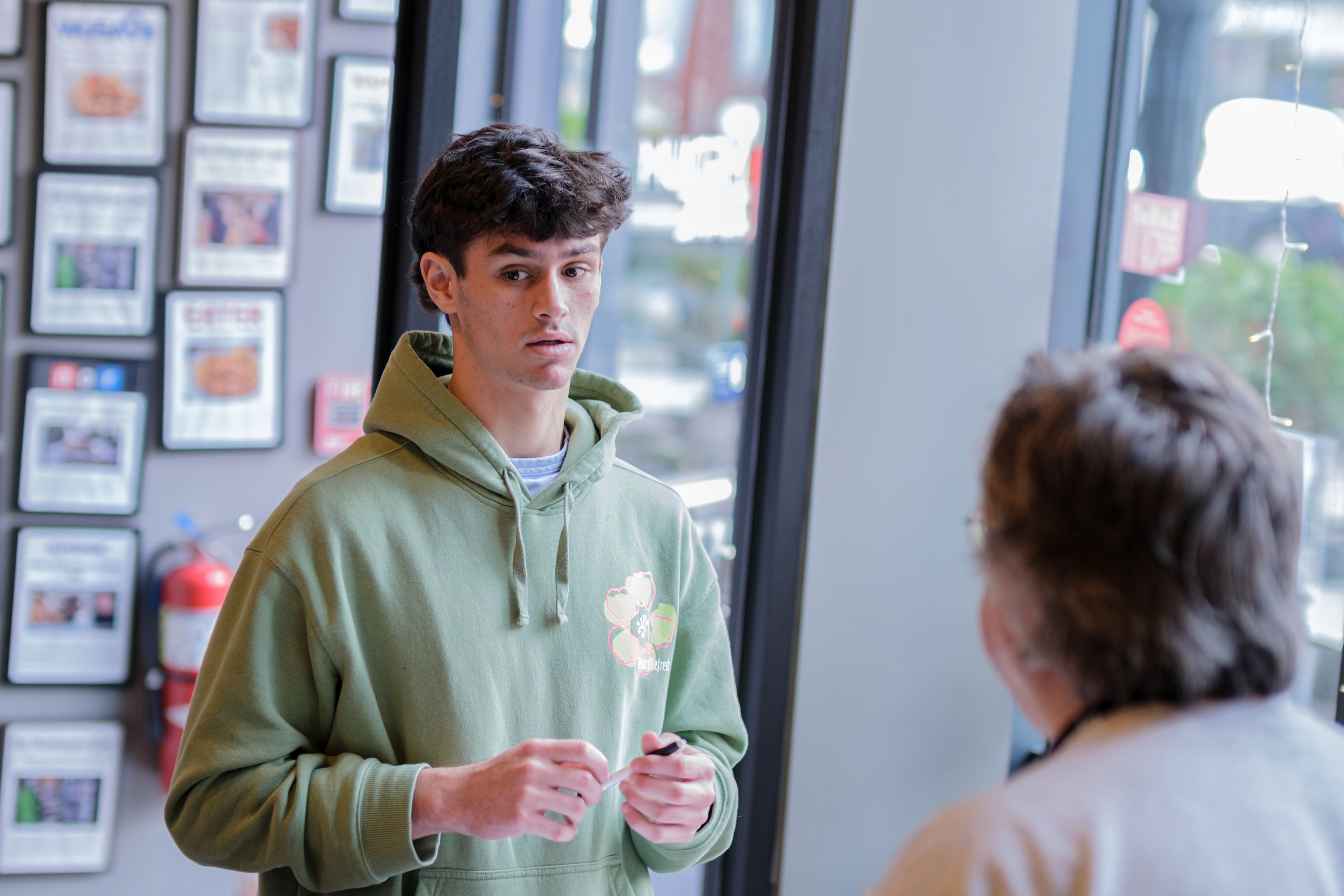 Volunteer delivery driver going over instructions