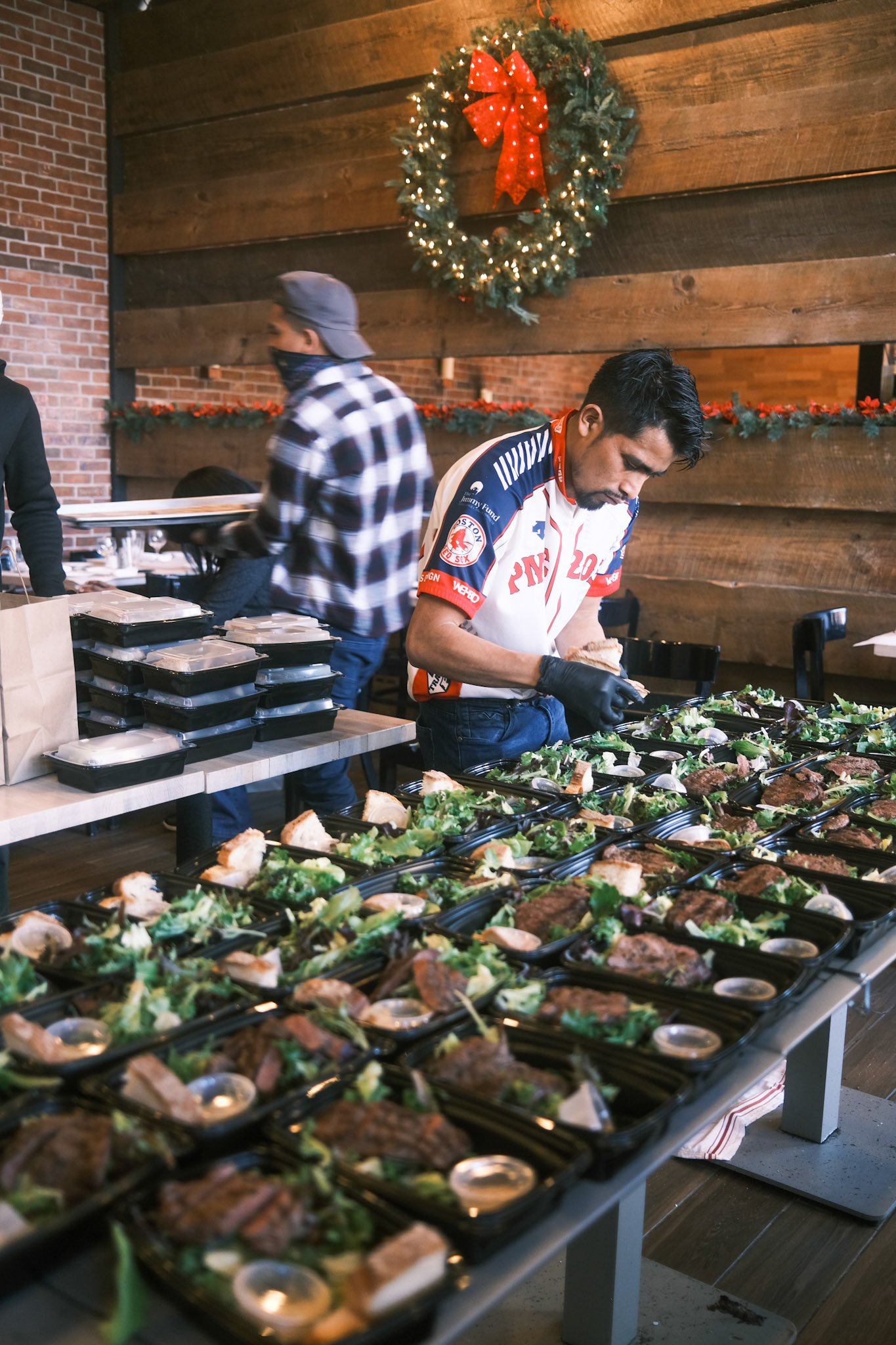 steak salads being prepared for delivery