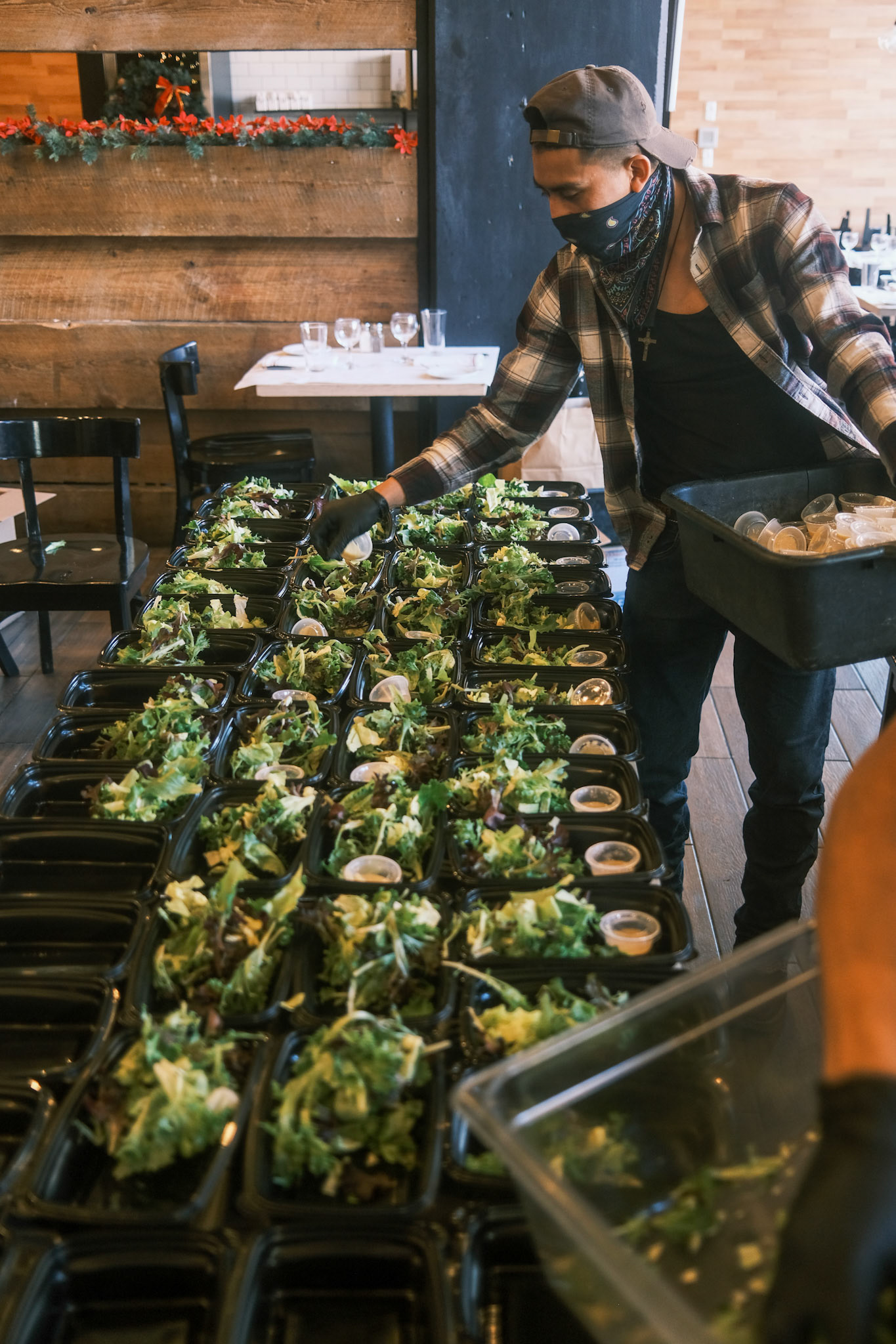 individual salads being prepared