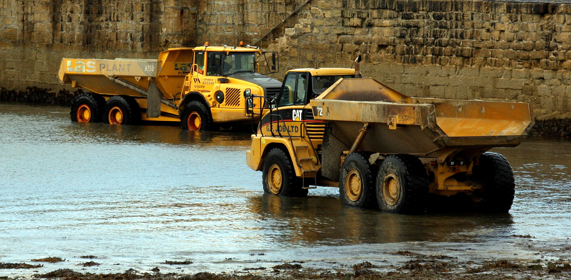 GF Job are still on the go - based in Nairn. From 2007 onwards they were doing harbour works and coastal protection projects for the Highland and Moray Councils. I guess that's what is going on here. Las Plant are still on the go, based in Inverness.