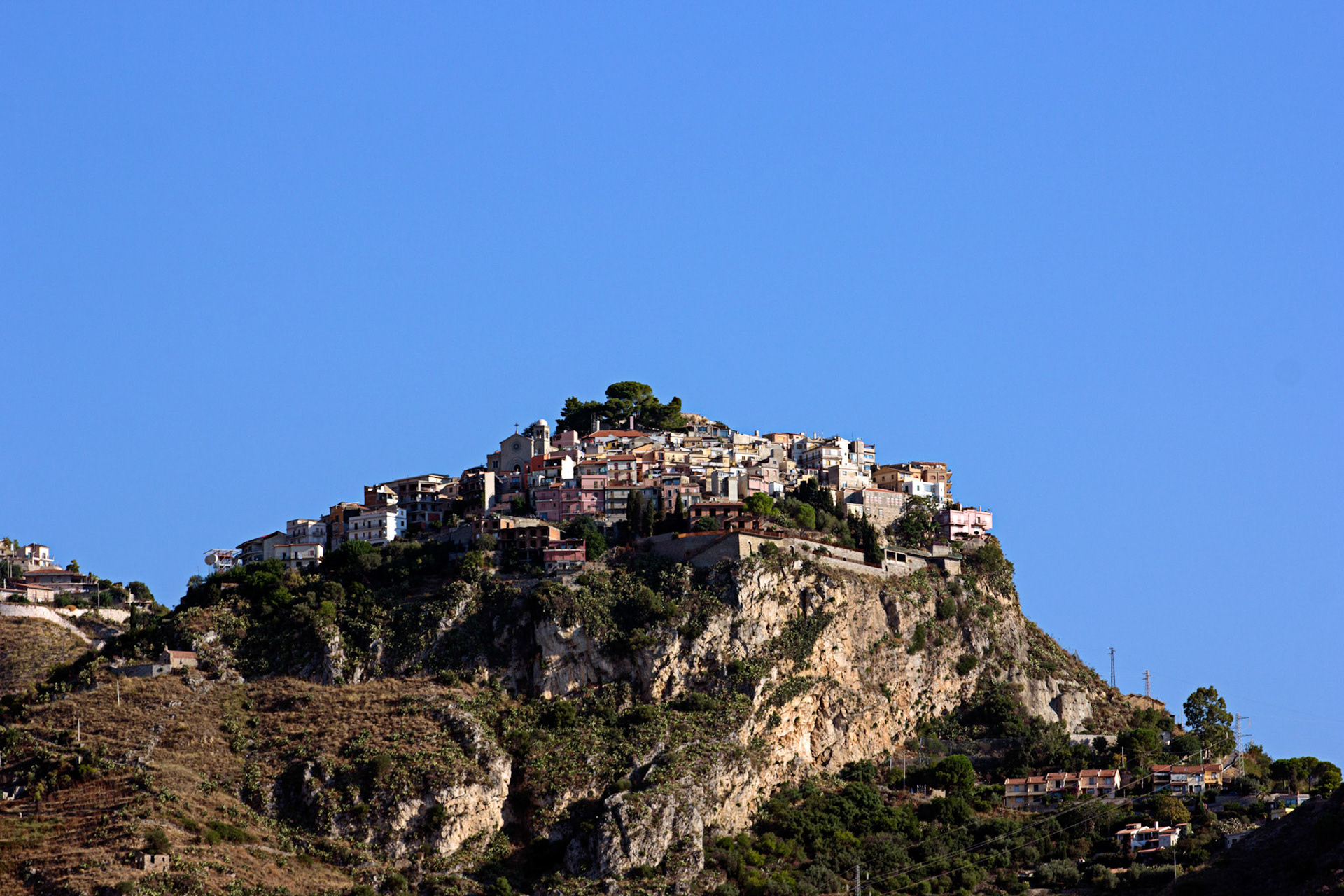 Castelmola viewed from Naxos on Sicily. Apparently the Italians built their cities high up to discourage pirates, which were once common around the Italian coast, coming from several different countries throughout history.Please see my other Photographs at: www.jamespdeans.co.uk