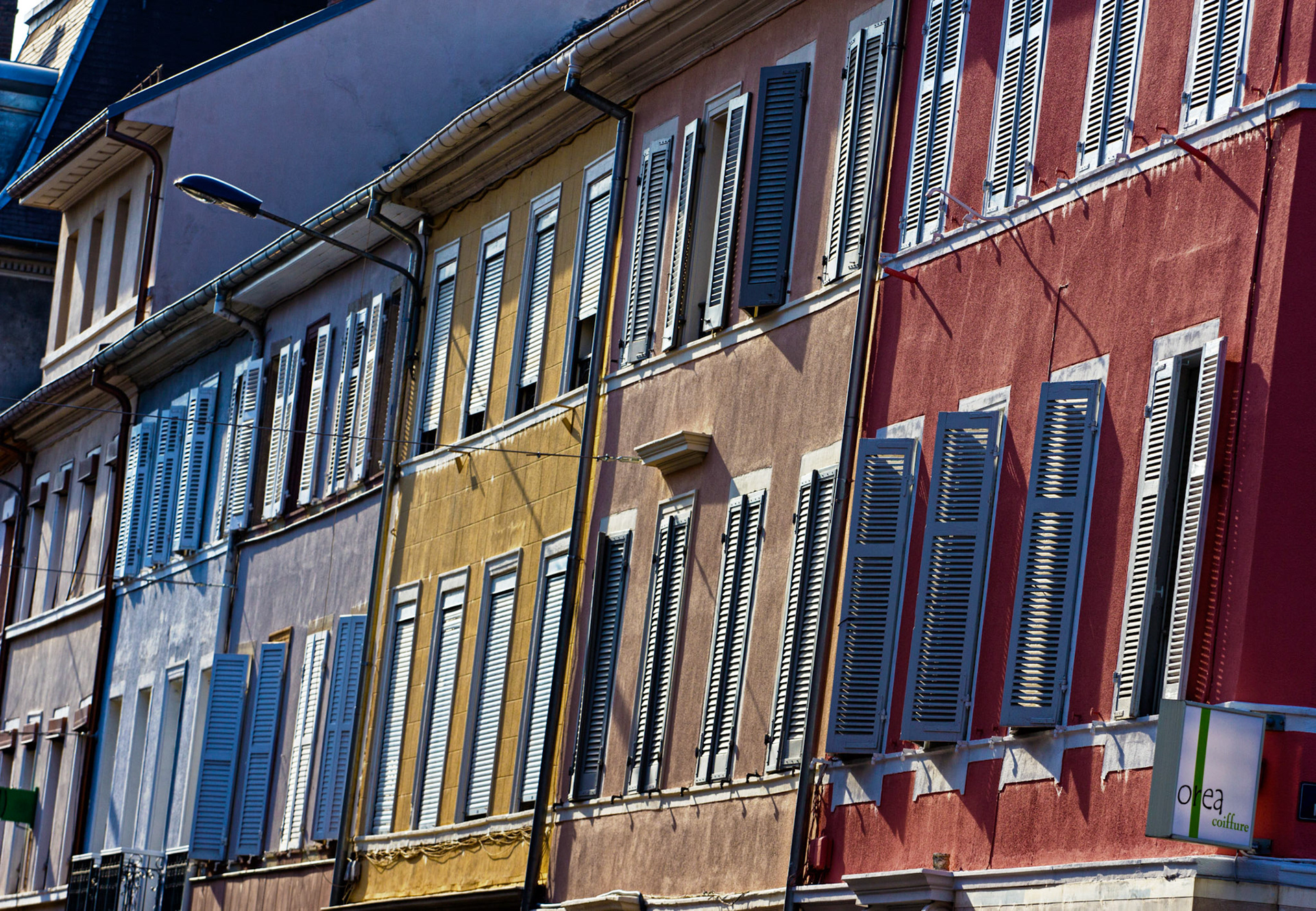 I often find myself taking shots similar to this. There's something about shutters that I love. Maybe, just because we don't have them in the UK.