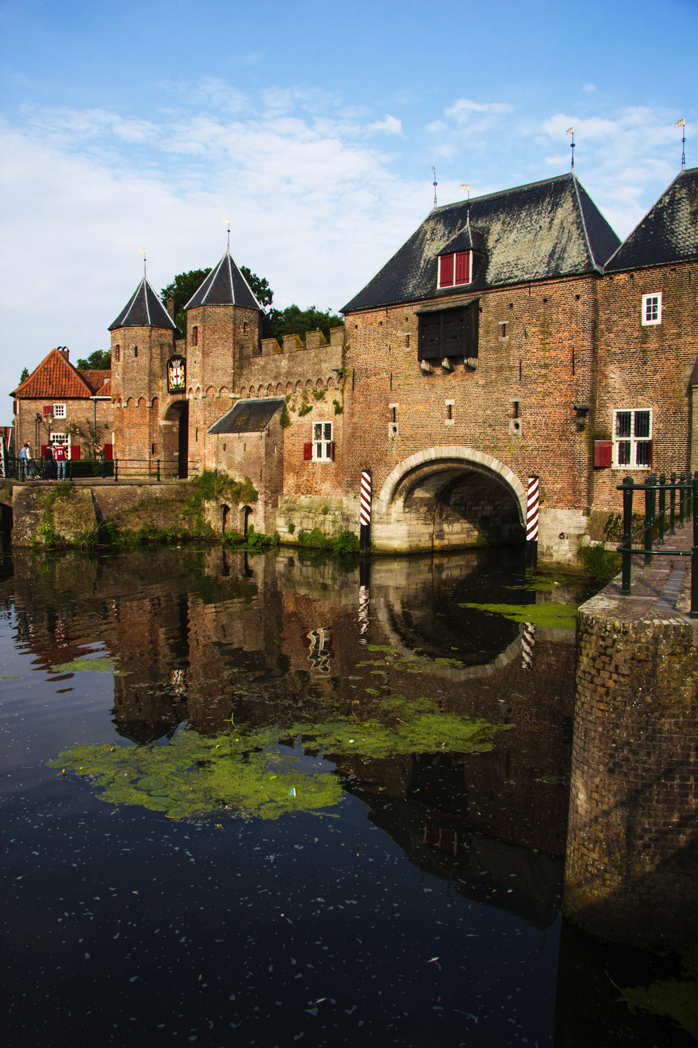The Koppelpoort is a medieval gate in Amersfoort. It was built in 1425.  It's a bridge, part of the town wall and a gate combining the road and canal gates.