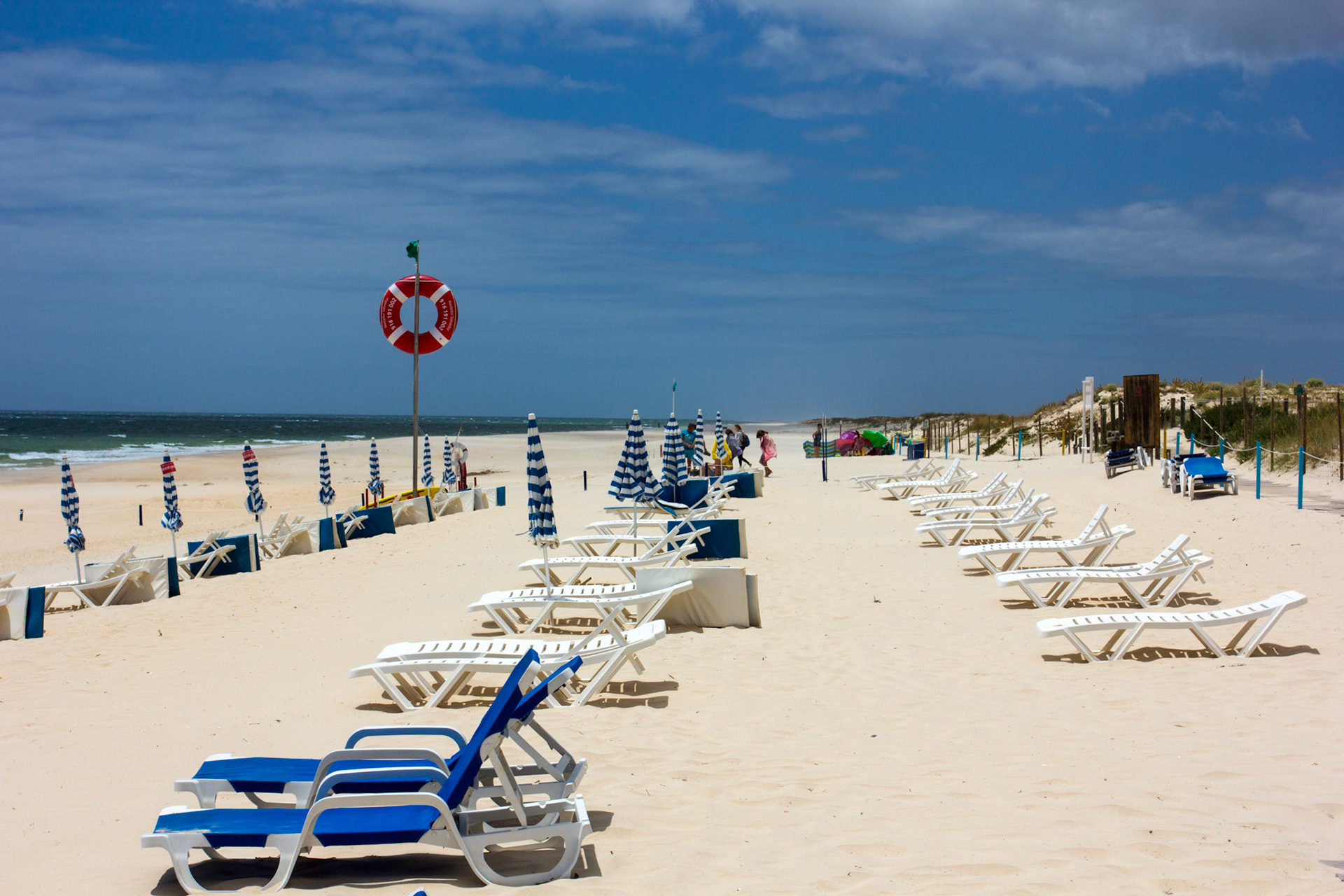 On Tavira Island - Praia do Barril beach. A quiet day as the tourists don't like getting sand blasted. Please see my Photographs of Portugal at: http://www.jamespdeans.co.uk/p116503744