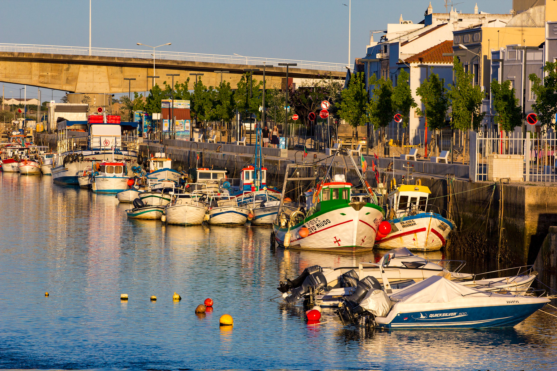 Boats at the quay at sunset in Tavira