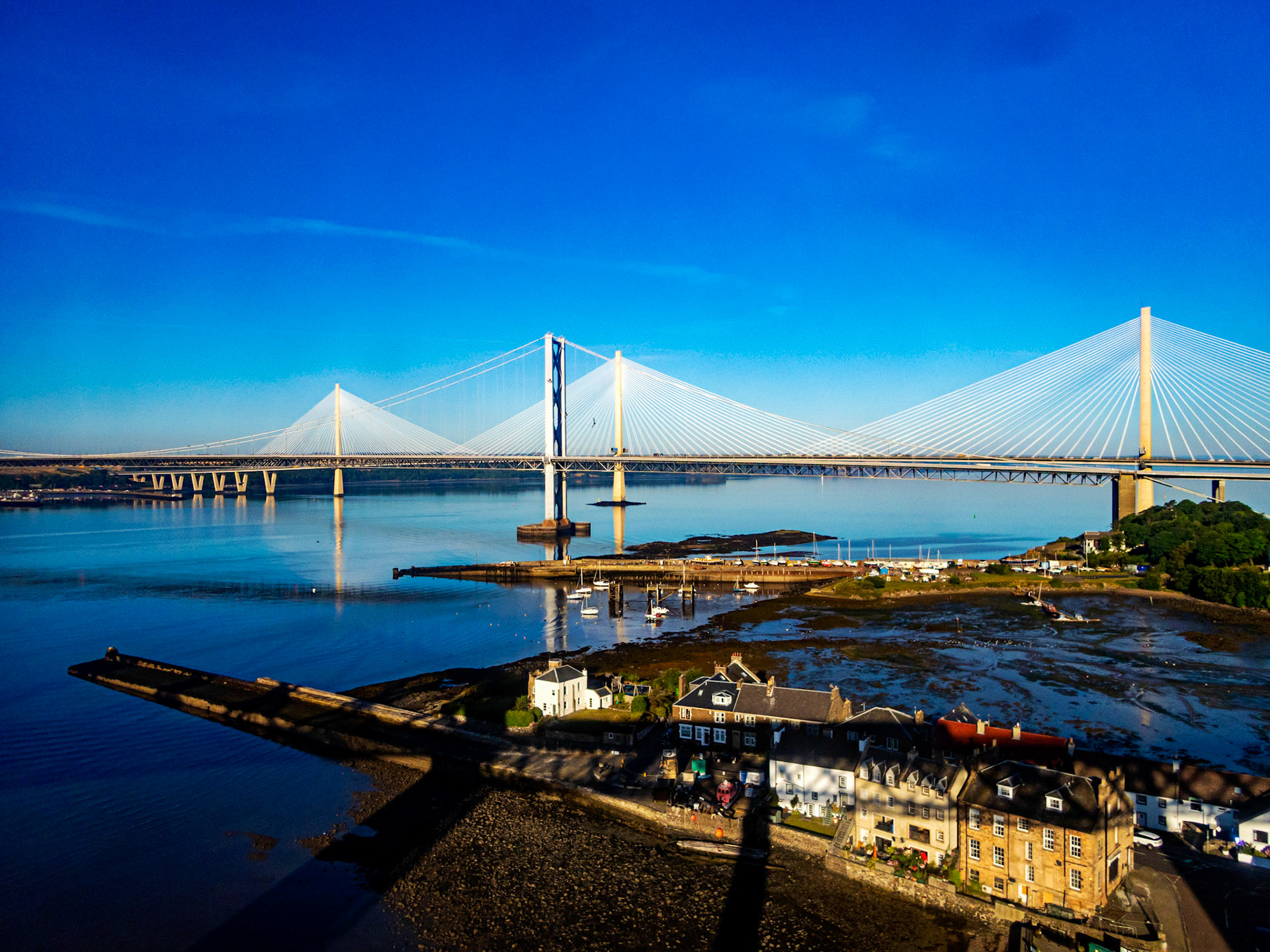 View over road bridges from train on Forth Bridge