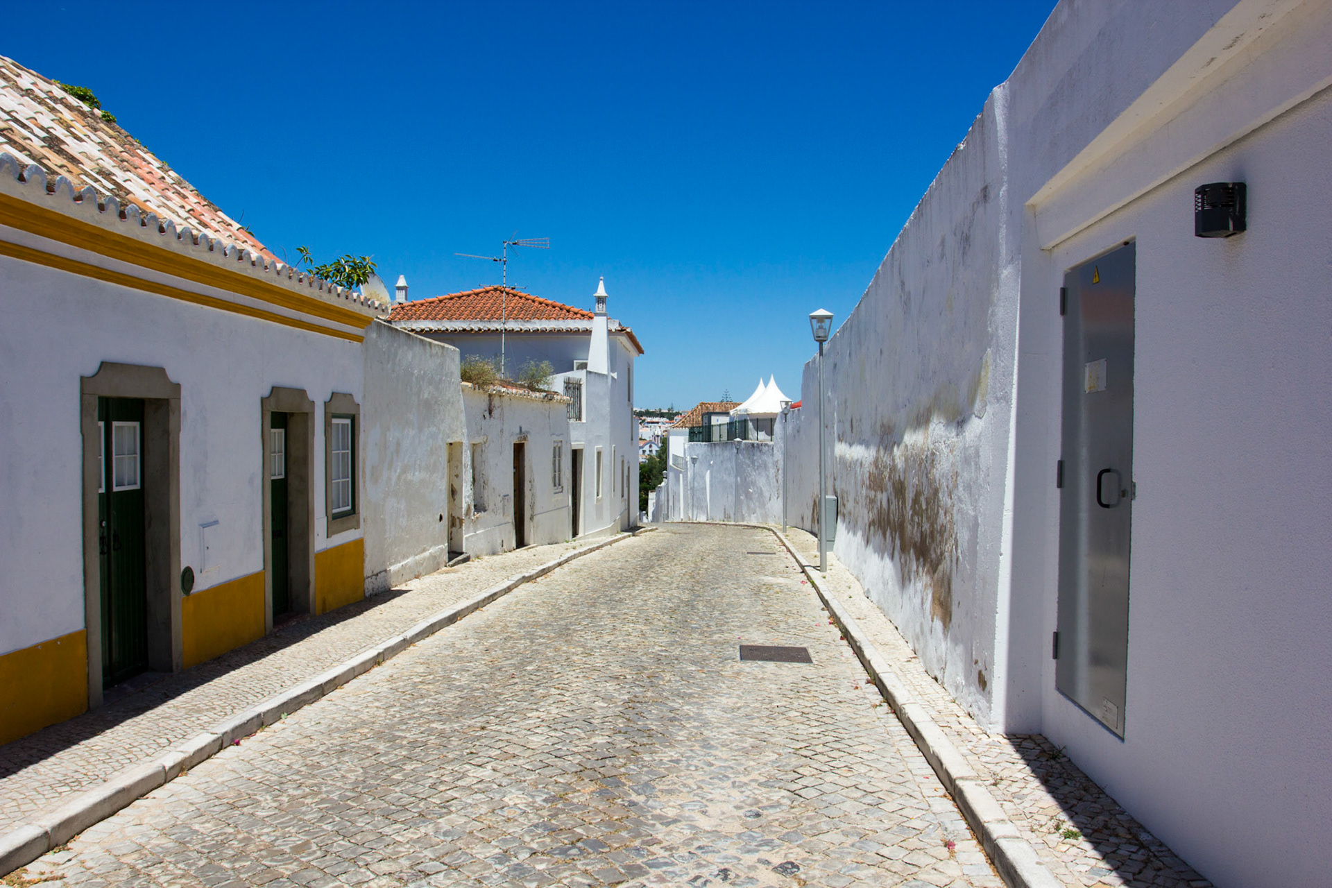 Hot street in Tavira - roll on Summer!Please see my other Photographs at: www.jamespdeans.co.uk