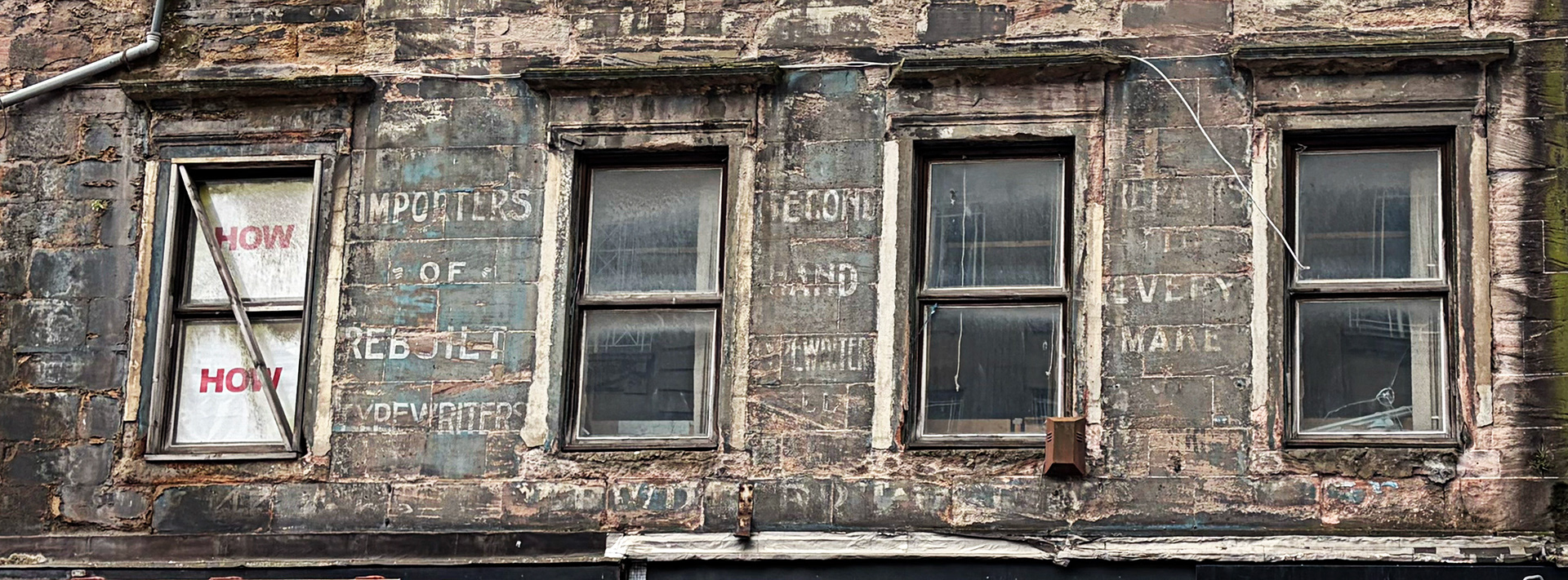 Glasgow 15 April 2026 - Ghost sign for Importers of Rebuilt Typewriters.