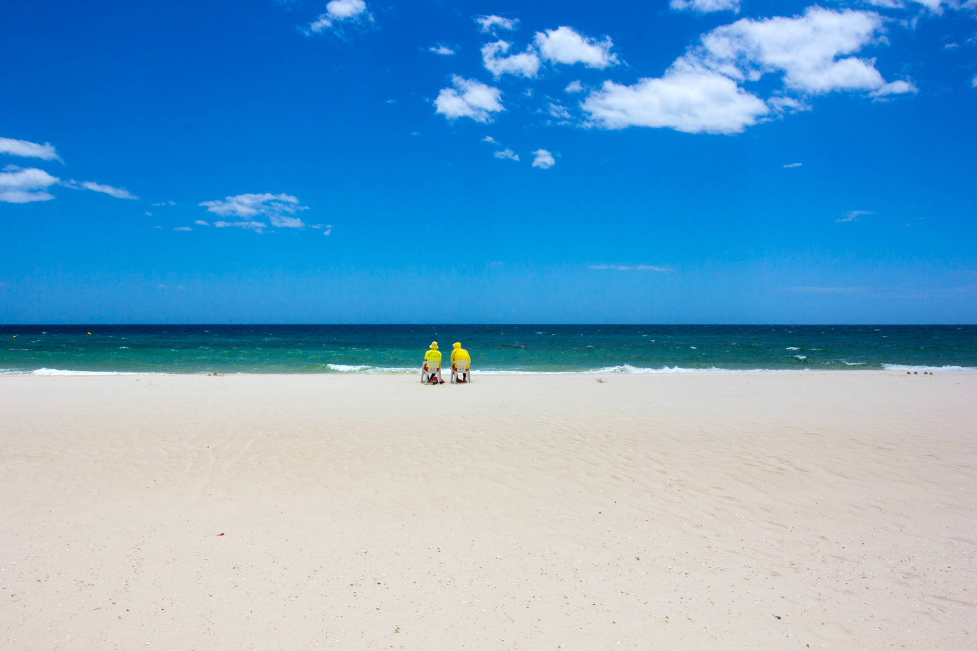 On Tavira Island - Praia do Barril beach. The lifeguards having a quiet day as the tourists don't like getting sand blasted.   Please see my Photographs of Portugal at: http://www.jamespdeans.co.uk/p116503744
