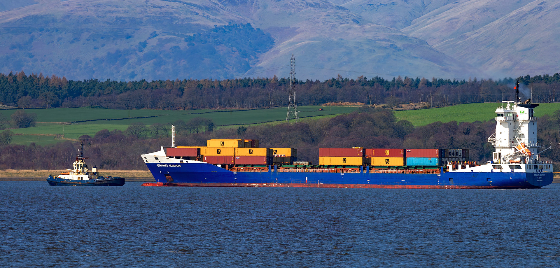 Bo'ness 19 March 2026. SVITZER ALMA towing Bernhard Schepers (Container Vessel) in to Grangemouth Docks.