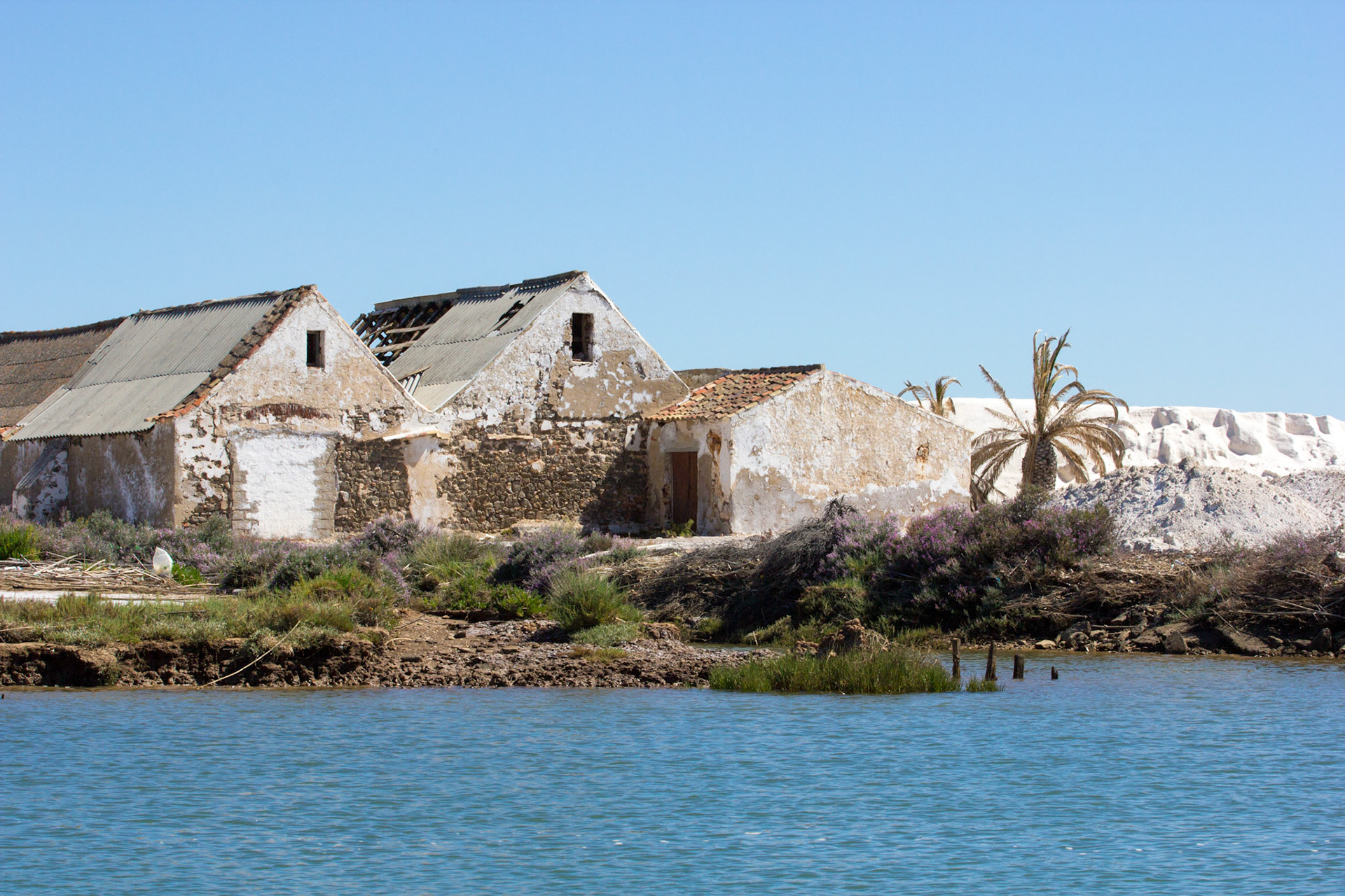 Old building &amp; a pile of salt at the Tavira Salt PansPlease see my other Photographs at: www.jamespdeans.co.uk