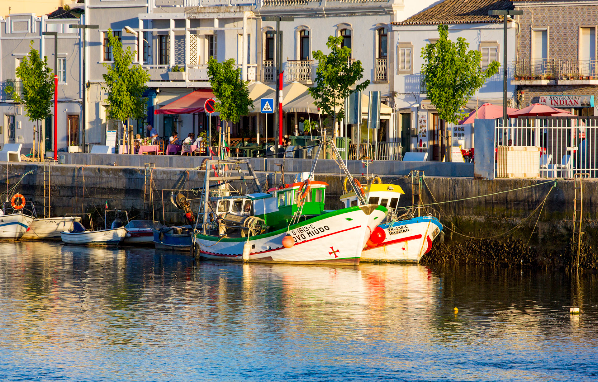 Boats at the quay at sunset in Tavira
