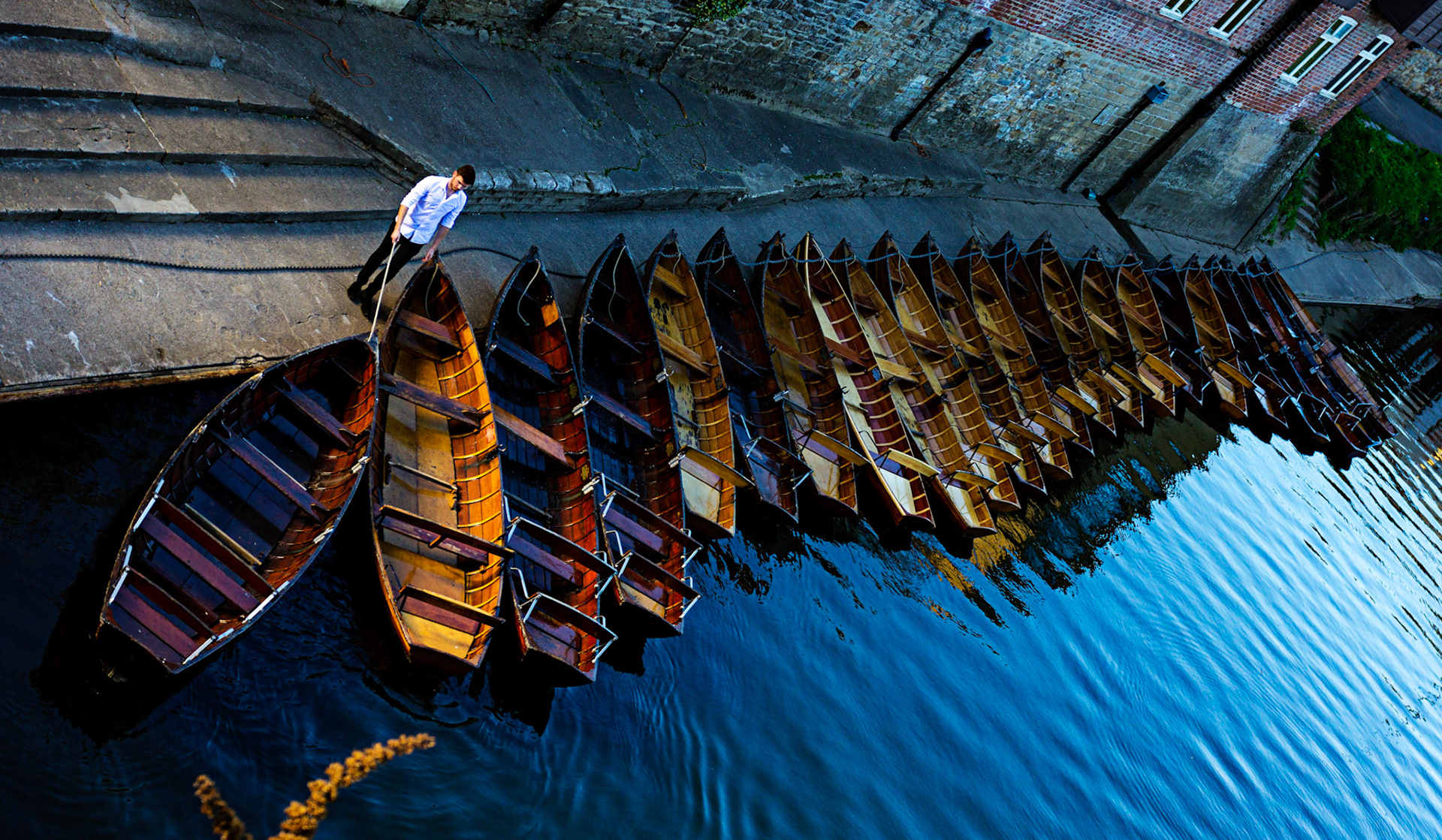 Durham 04 May 2018Brown's Rowing Boats - next to Elvet Bridge. The nightly tie up in progress.