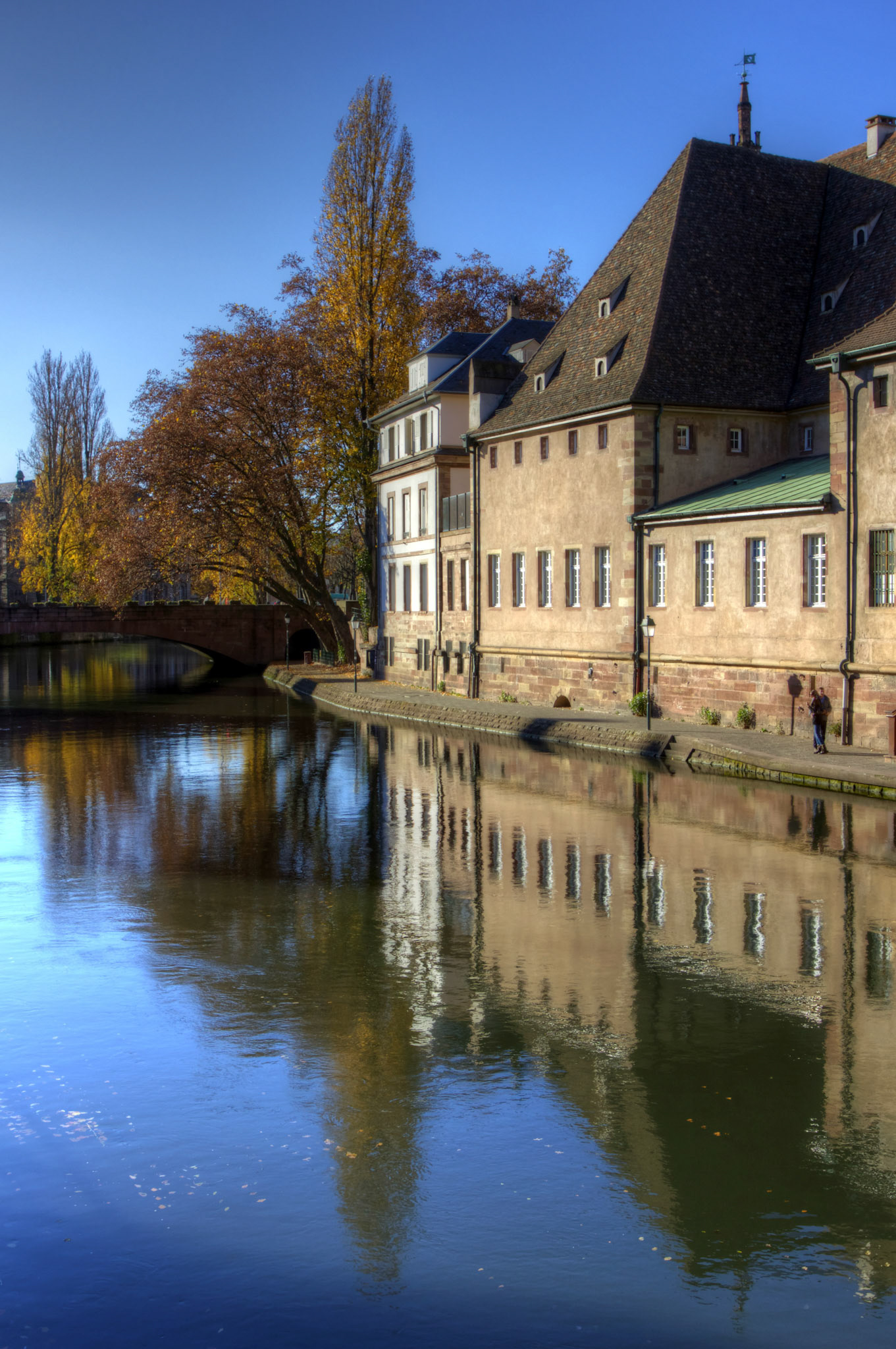 The old customs house in Strasbourg. This building has been rebuilt quite a few times, including the 1960s. In 1497 there was a major fire here and people jumped out of the narrow windows into the river. People managed to escape until a rather fat monk tried to escape. He got stuck causing the deaths of 26 people.Please see my other Photographs at: http://www.jamespdeans.co.uk/