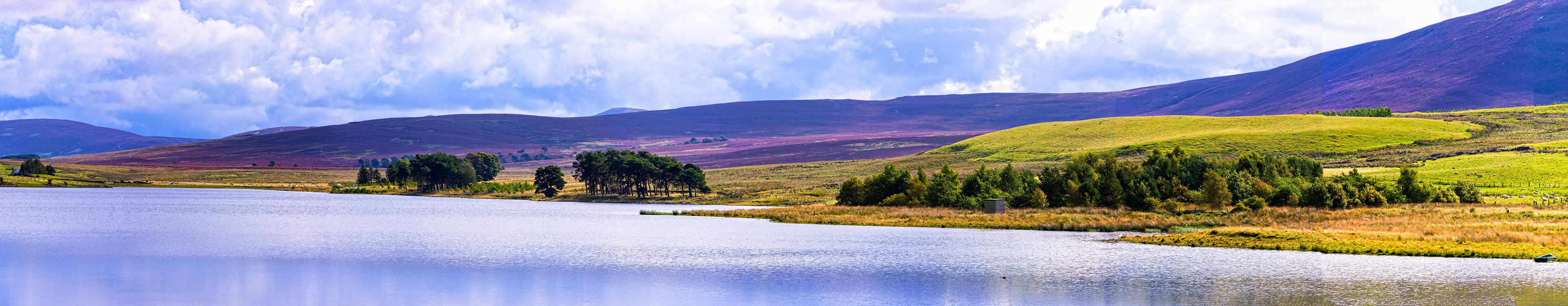Pentland Hills. The water is Harperrig Reservoir. Viewed from Colzium.
