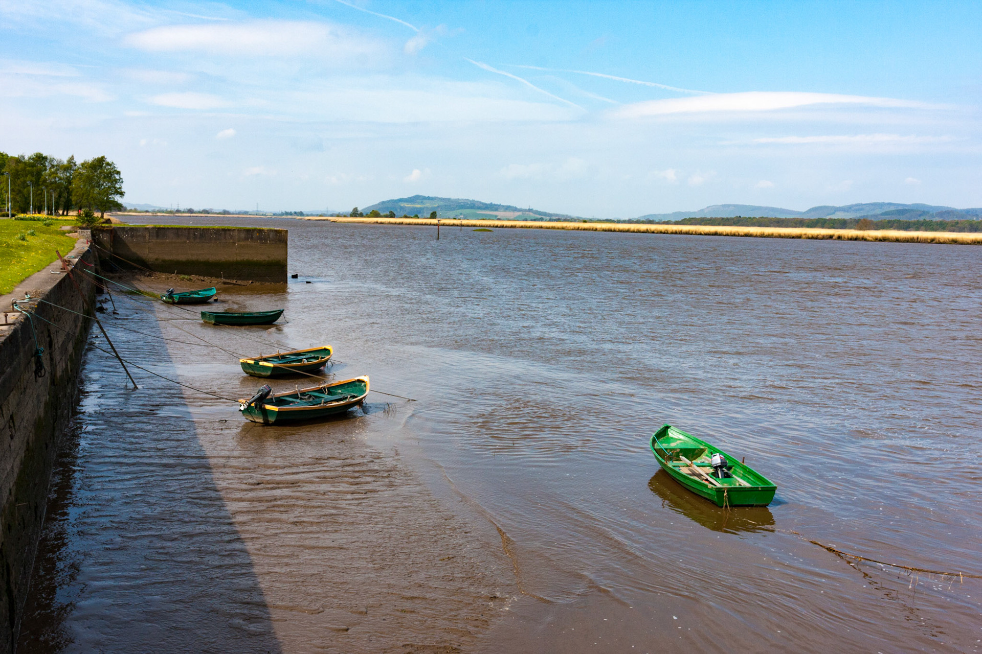 Newburgh Harbour on the Firth of Tay. Sadly, the old fishing boats have been removed. I know the residents may have found them to be a mess, but they were photogenic.