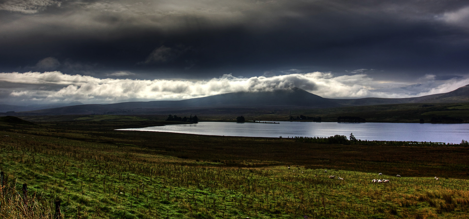 East Cairn Hill in the Pentland Hills. The water is Harperrig Reservoir. Viewed from the Lang Whang (A70) at Harperrig Reservoir. Please see my other Photographs at: http://www.jamespdeans.co.uk