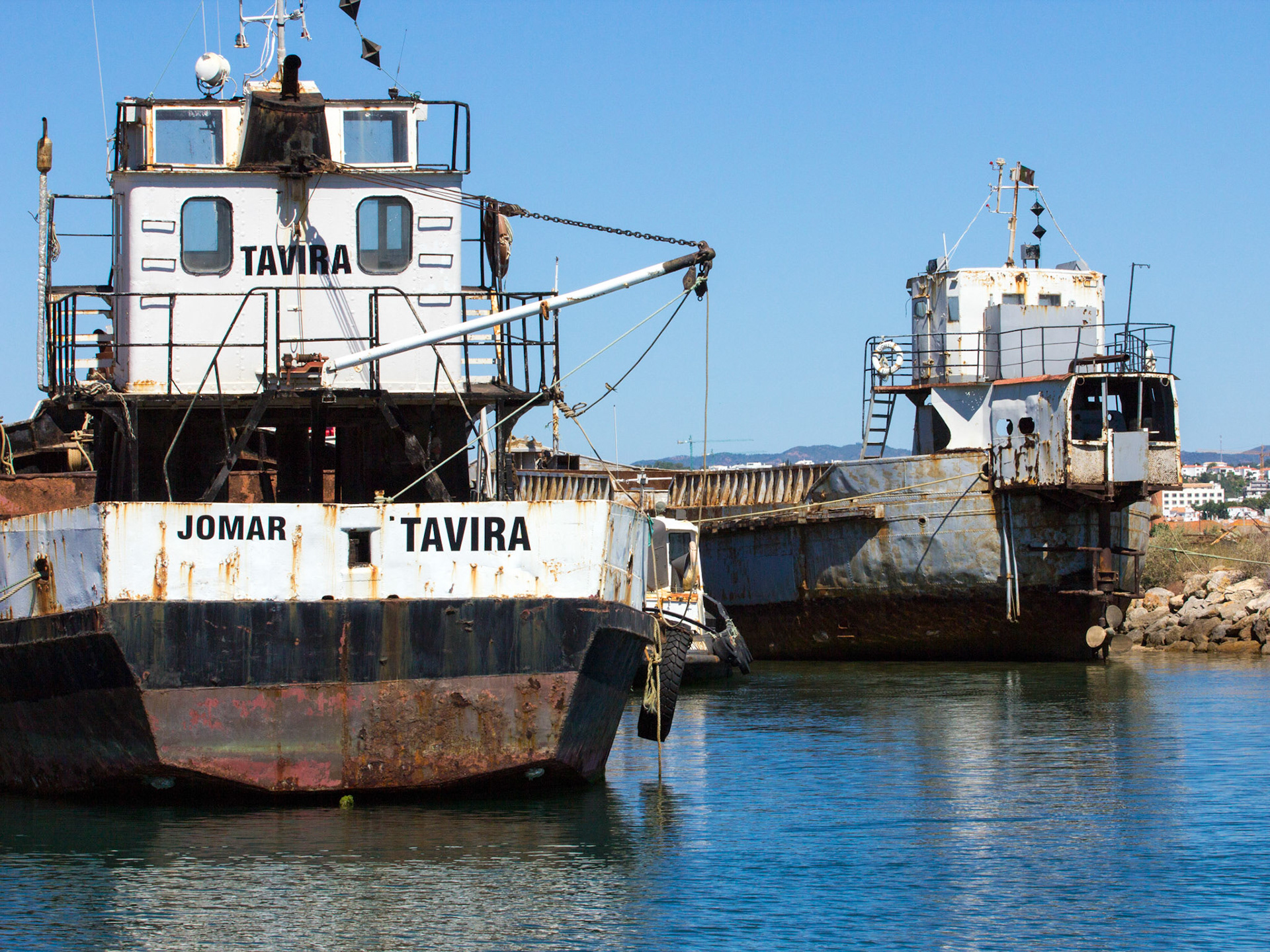 Ships lying in a harbour on the Gilao River.Please see my Photographs of Portugal at: http://www.jamespdeans.co.uk/p116503744