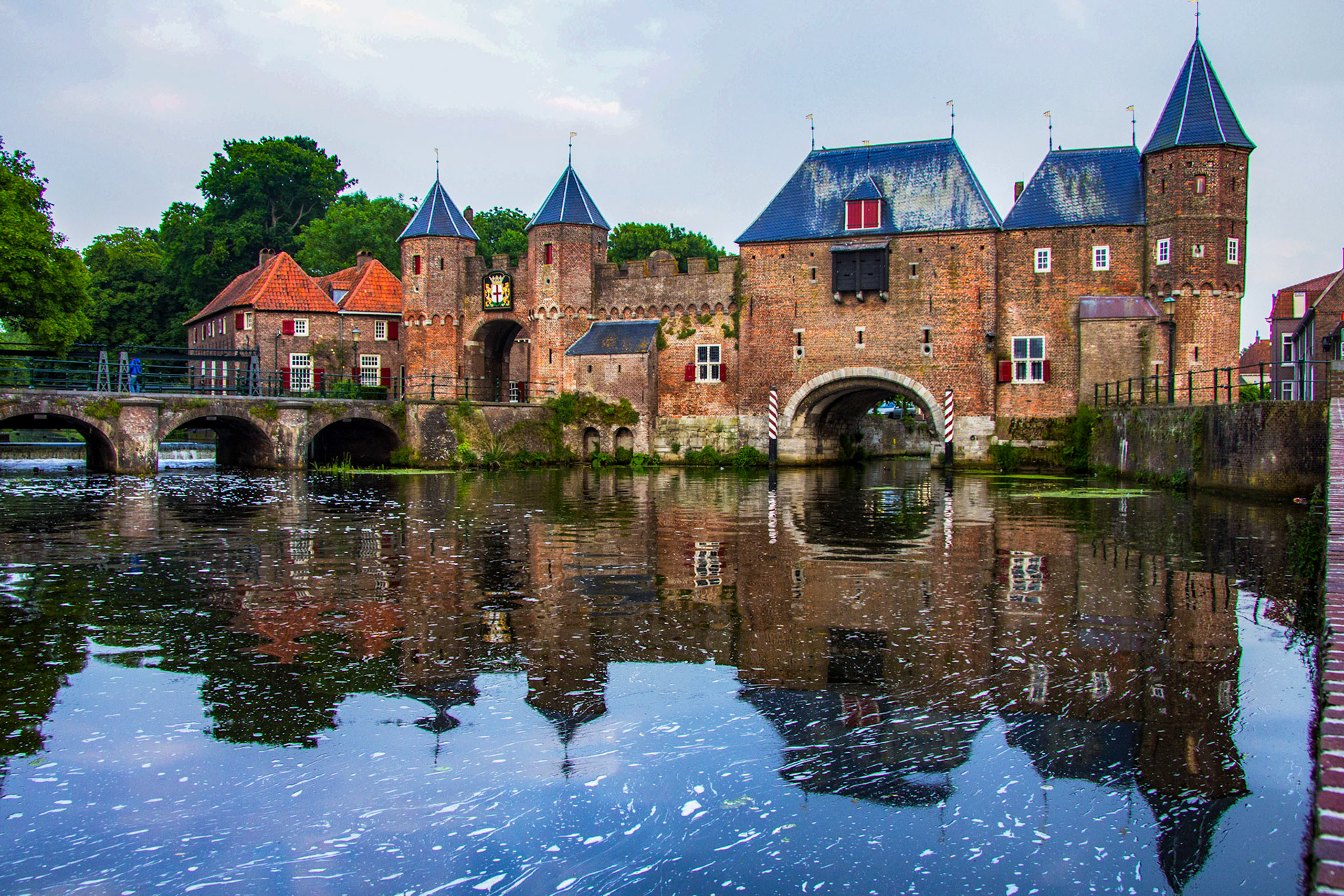 Amersfoort - Koppelpoort medieval gate Amersfoort, Netherlands. Build c1425 - it is a complex structure, being a gate covering the canal, 2 roadways and a bridge.