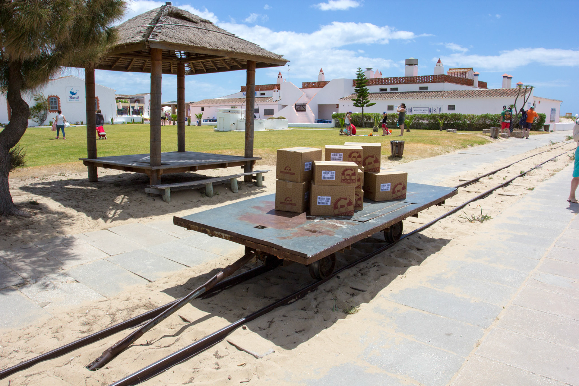 West of Santa Luzia is a narrow gauge railway across Tavira Island to Praia do Barril. The railway was for the use of the fishermen who lived on the island for several months each year, to help them move their catch (tuna) and equipment. After the fishery closed in 1966 the fishermen's houses and railway were converted for the use of tourists.
