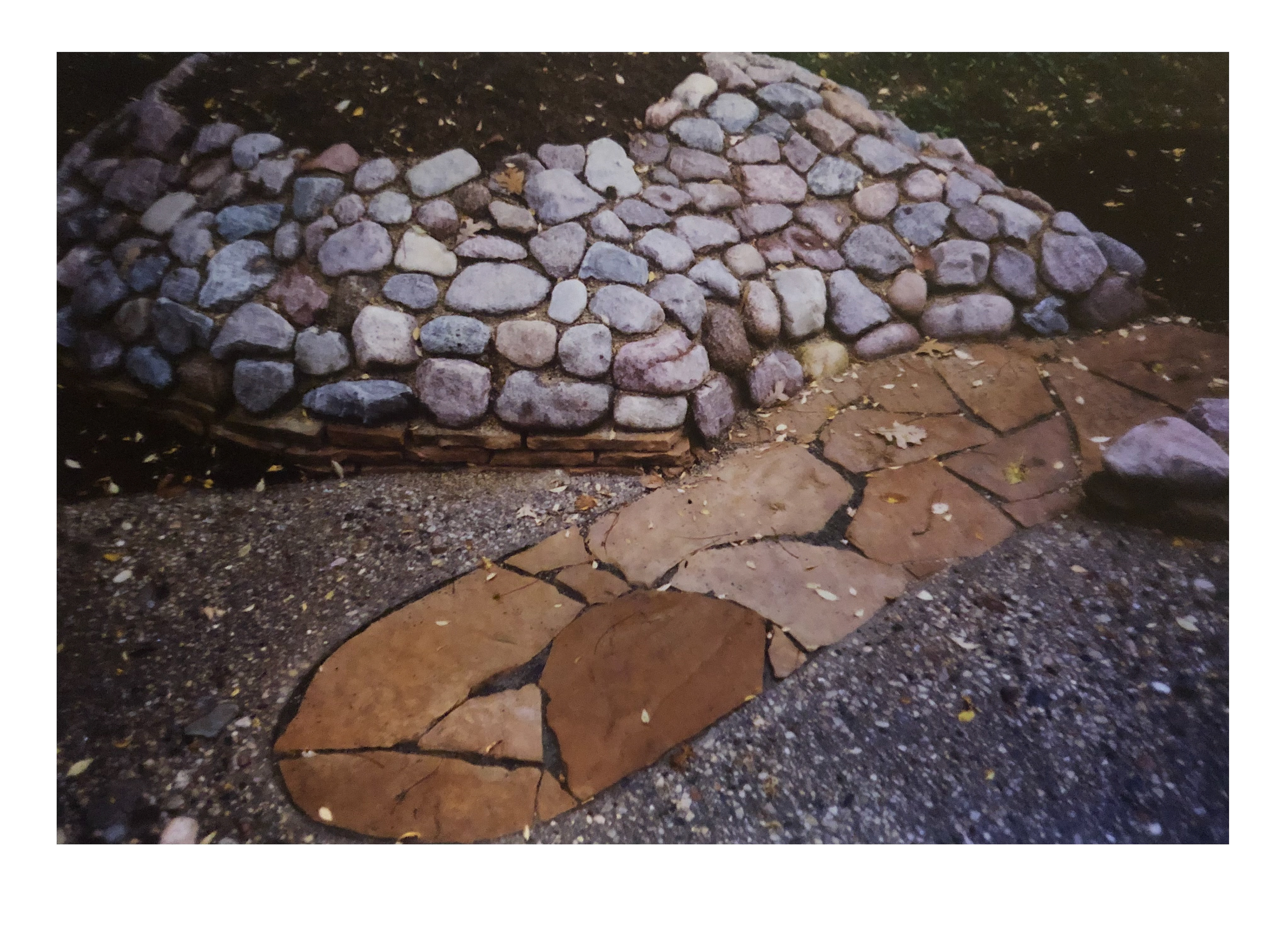 Limestone walk meets concrete patio.