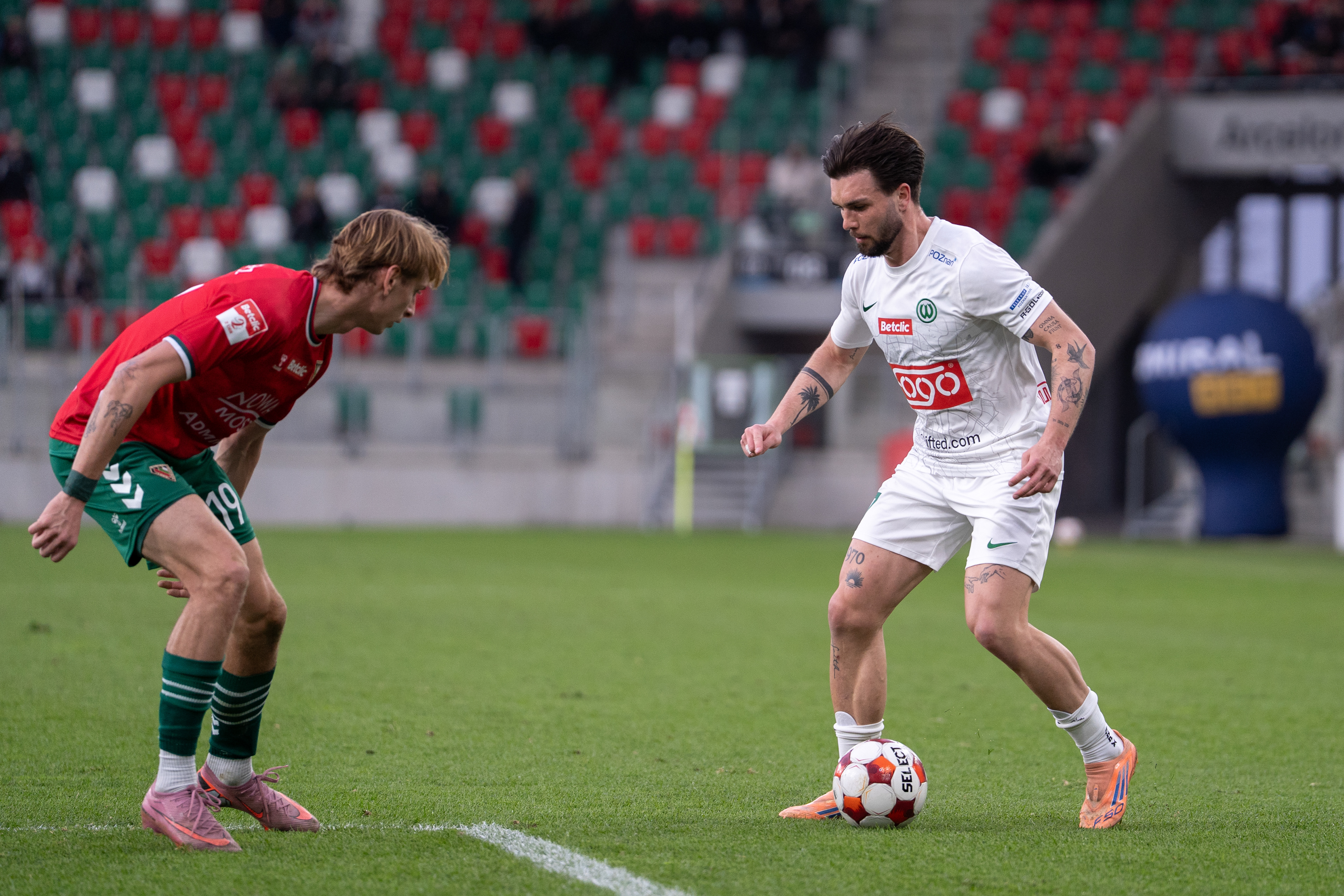 M. Stefaniak dribbles past M. Predenkiewicz in Sosnowiec