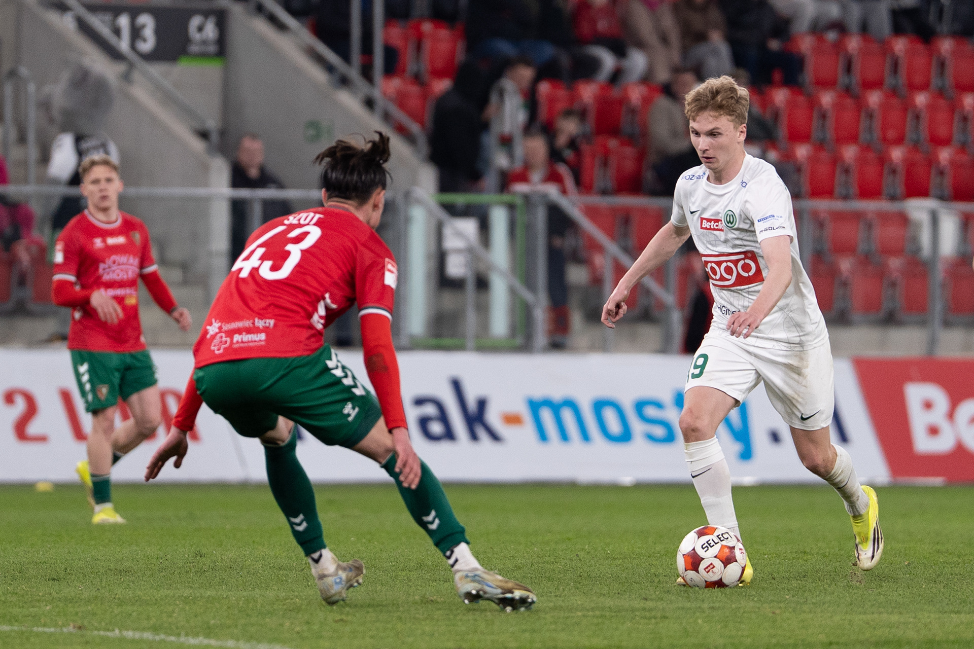 K. Szymanek in attack against Zaglebie Sosnowiec