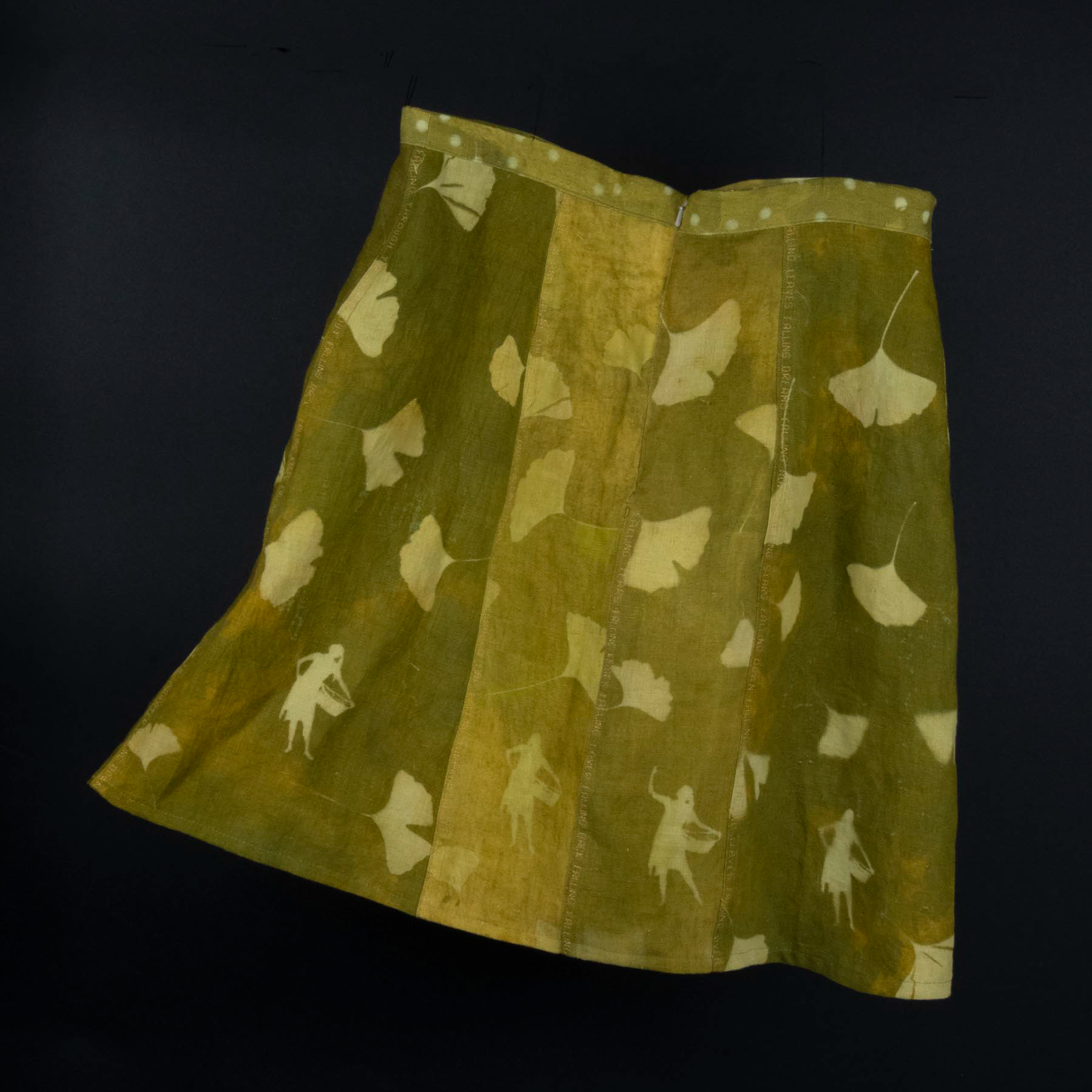 Falling, hand dyed linen skirt (designed, dyed, and sewn), with machine embroidery.