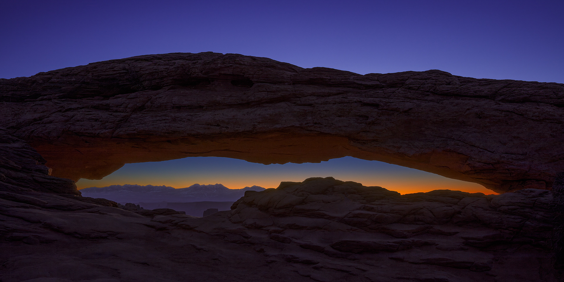 Image of a natural stone arch that Dean M. Chriss first photographed at sunrise about 40 years ago.