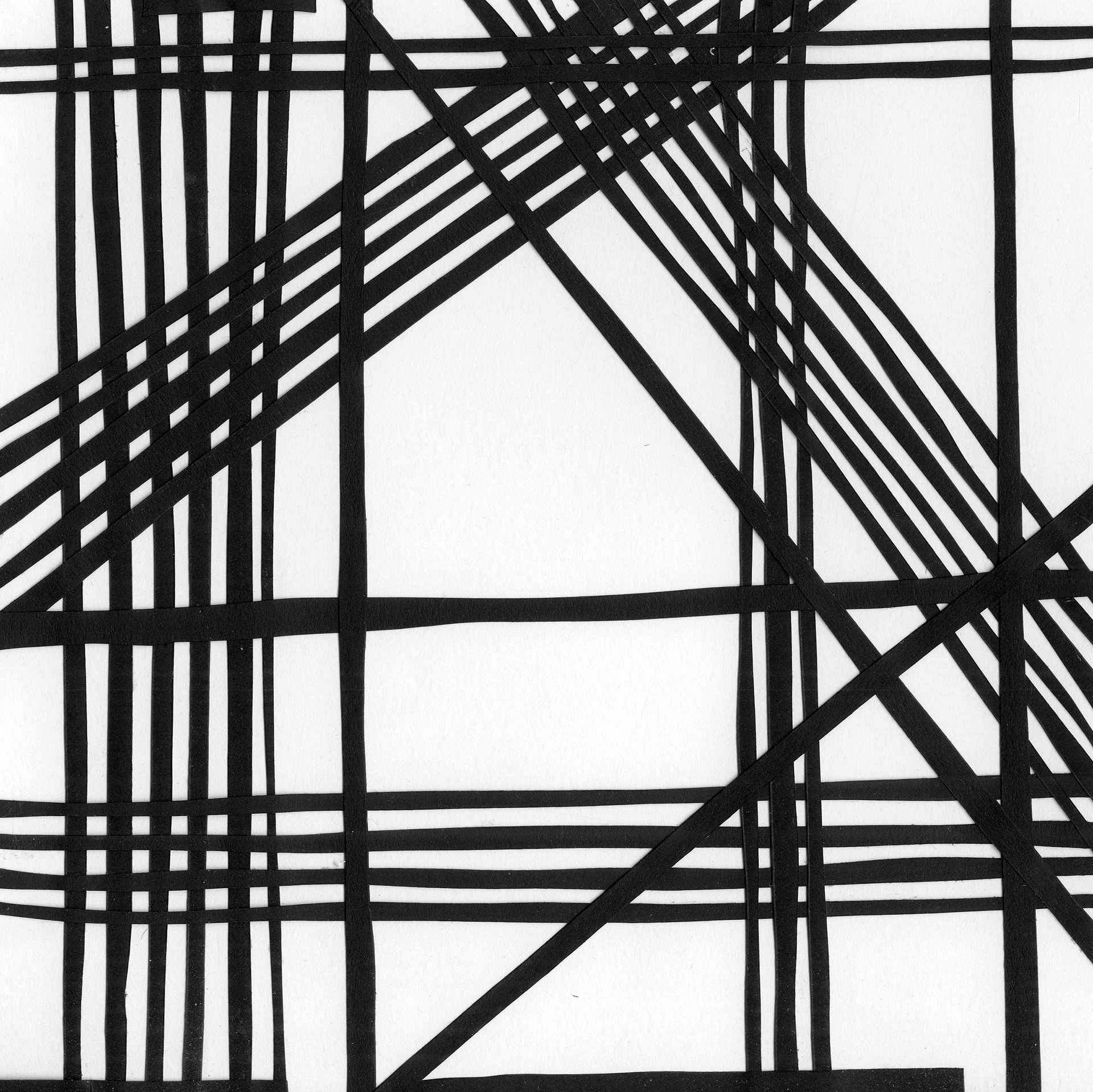 black and white plaid design made from thin strips of paper