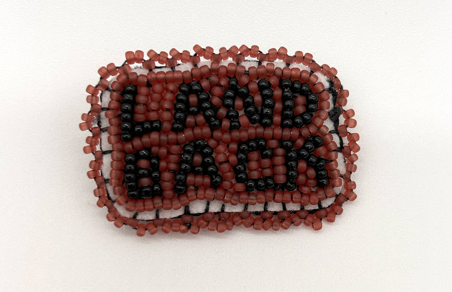 Land Back Beaded Pin