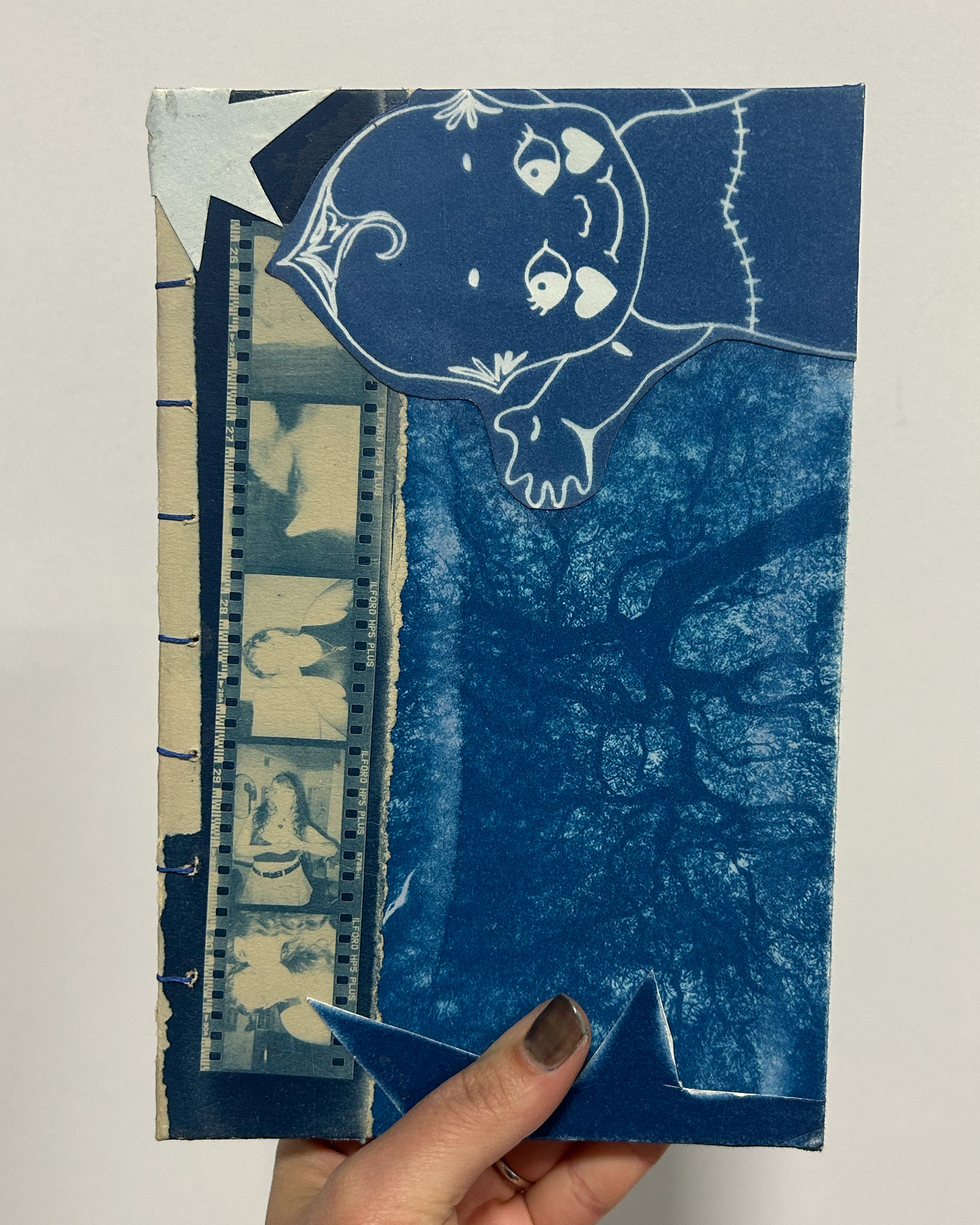  cyanotype collage coptic stitch sketchbook (front cover)