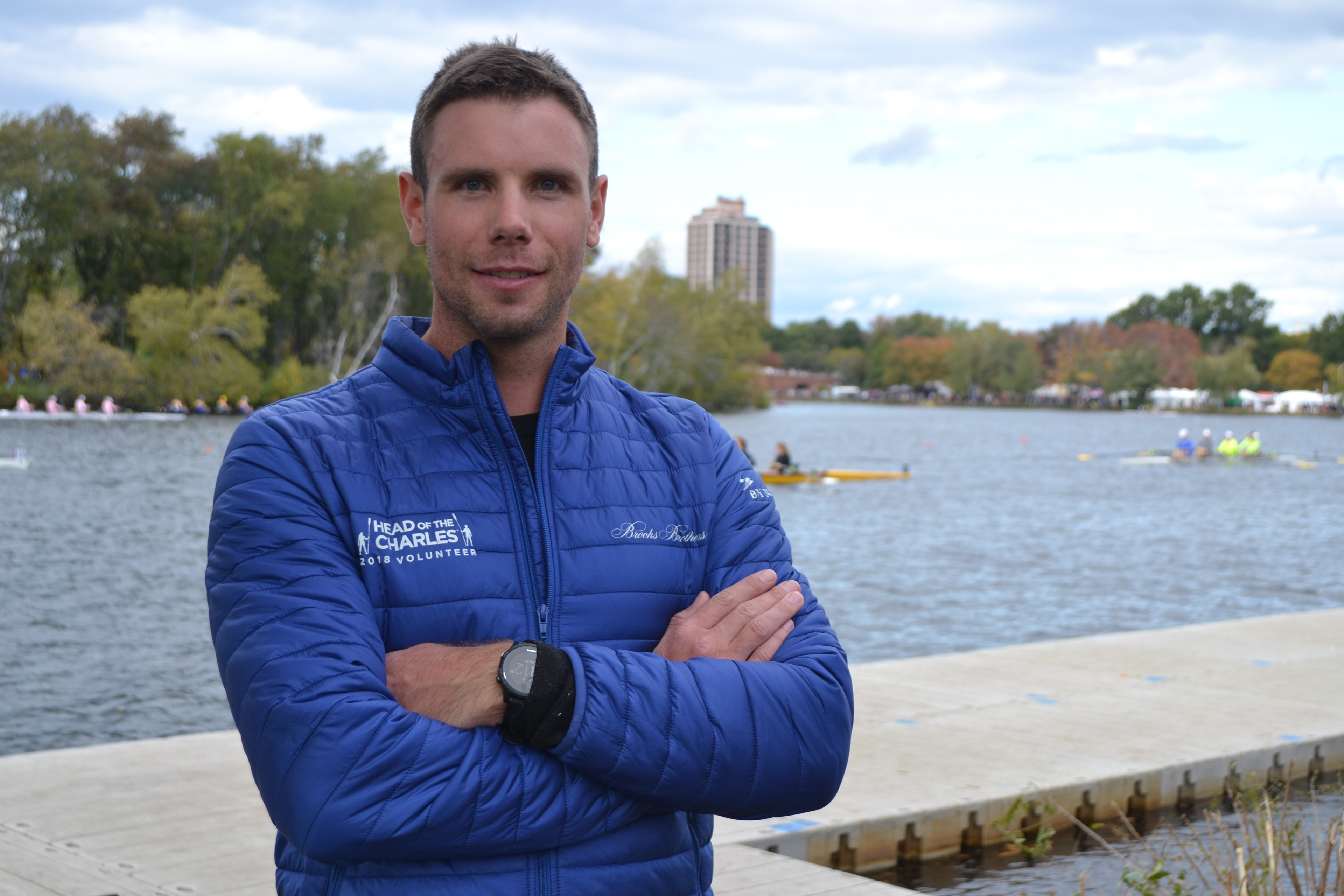 Kiwi Sculler Robbie Manson poses in front of the Charles River during the Head of the Charles Regatta in Oct. 2018. 
