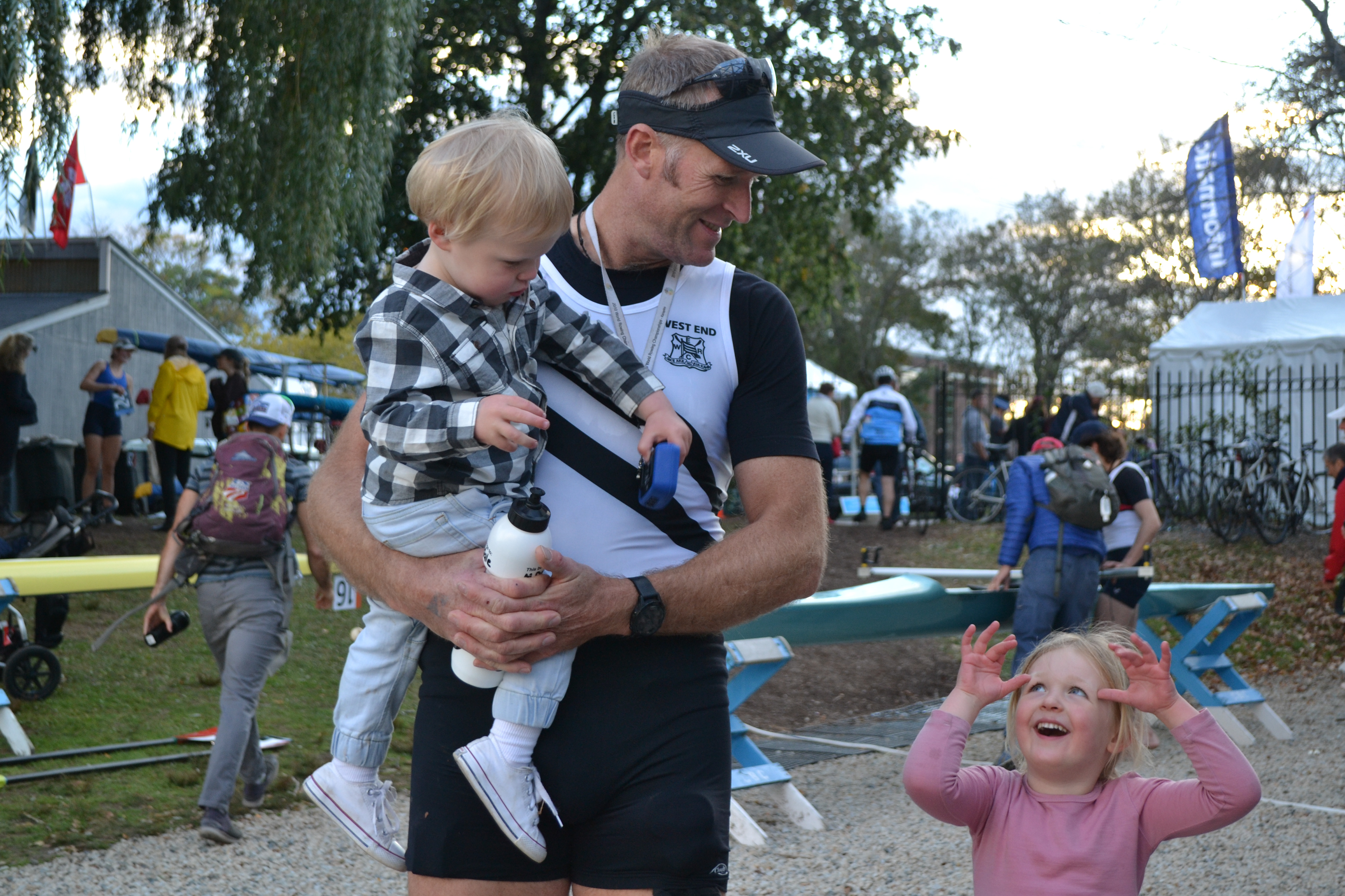 L to R, Boston, Mahe and Bronte Drysdale share a silly moment outside the Cambridge Boat Club at the Head of the Charles Regatta in Oct. 2018. 