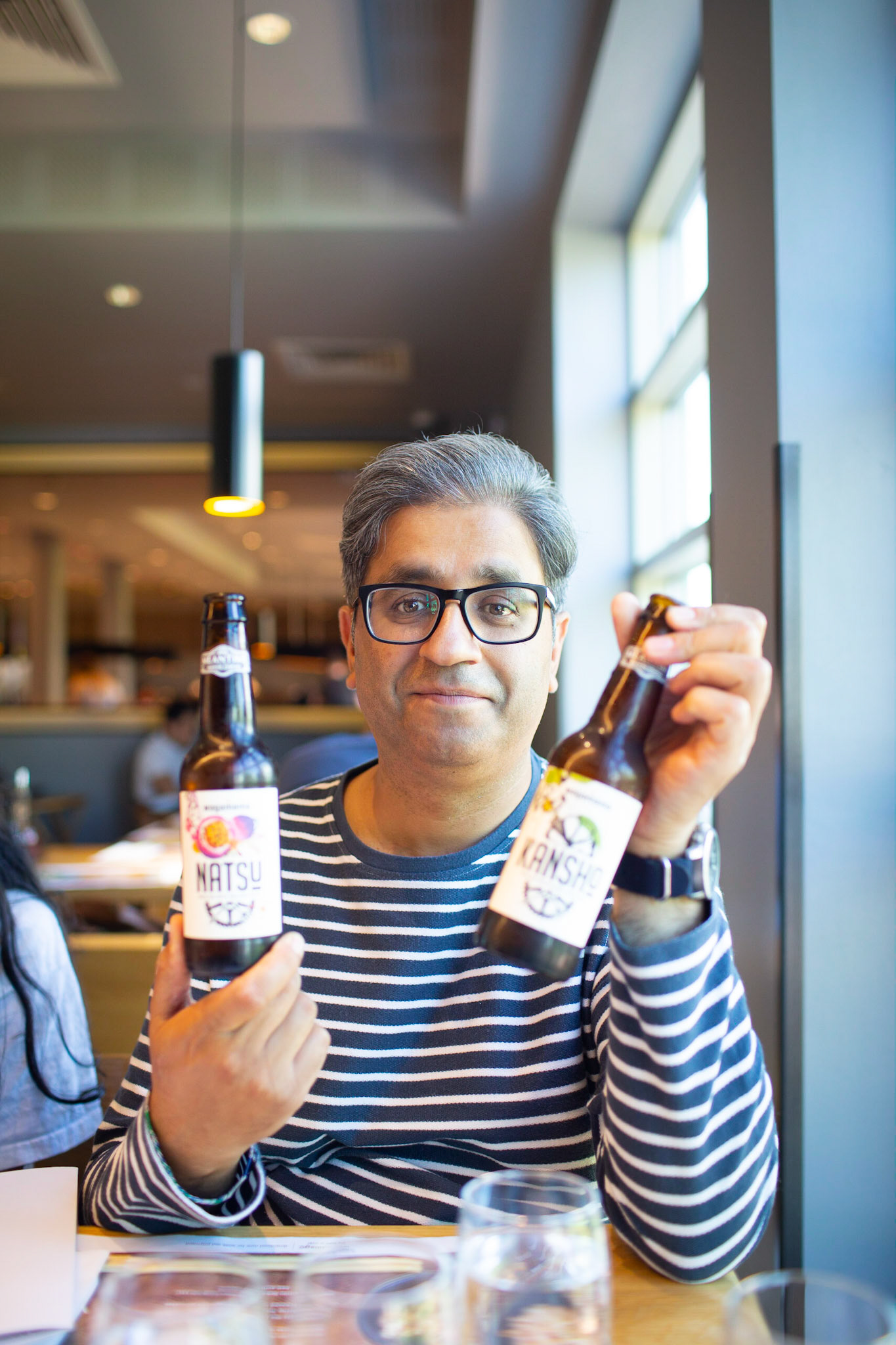 Rajesh in his element -- with a beer.