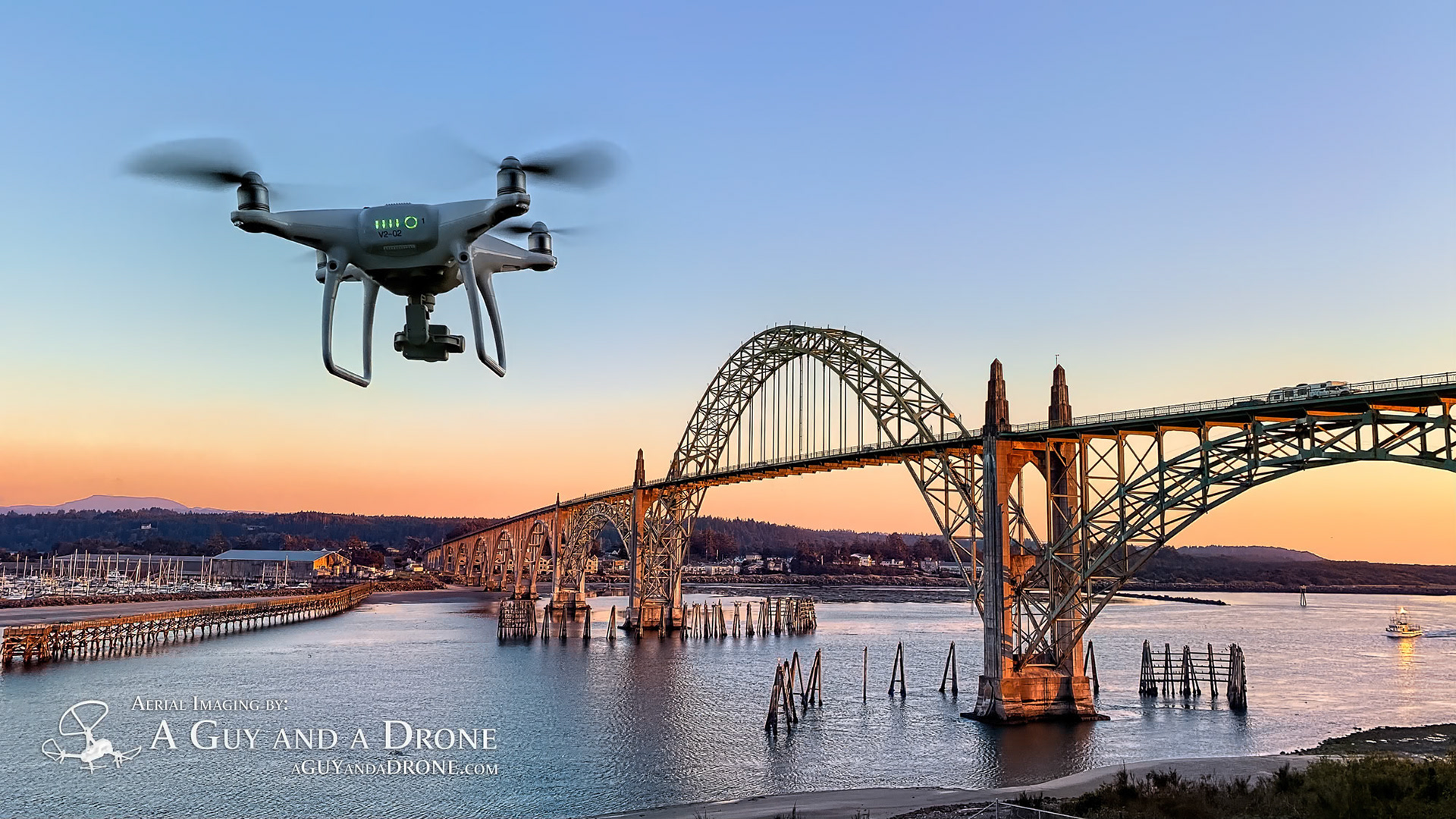 Drone flying over Yaquina Bay Bridge in Newport, Oregon. Oregon Coast Stock Photography