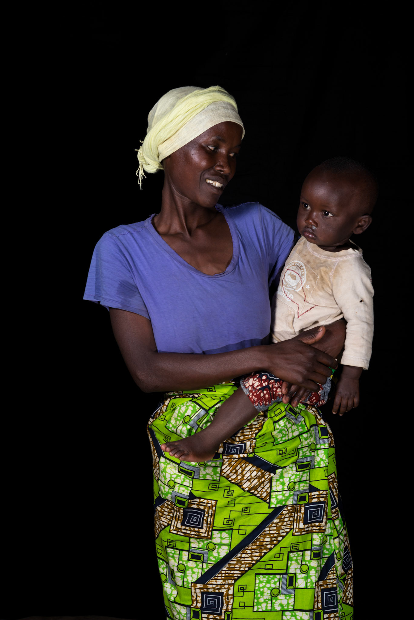 A year after joining her self-help group, Immaculate sits for a portrait.