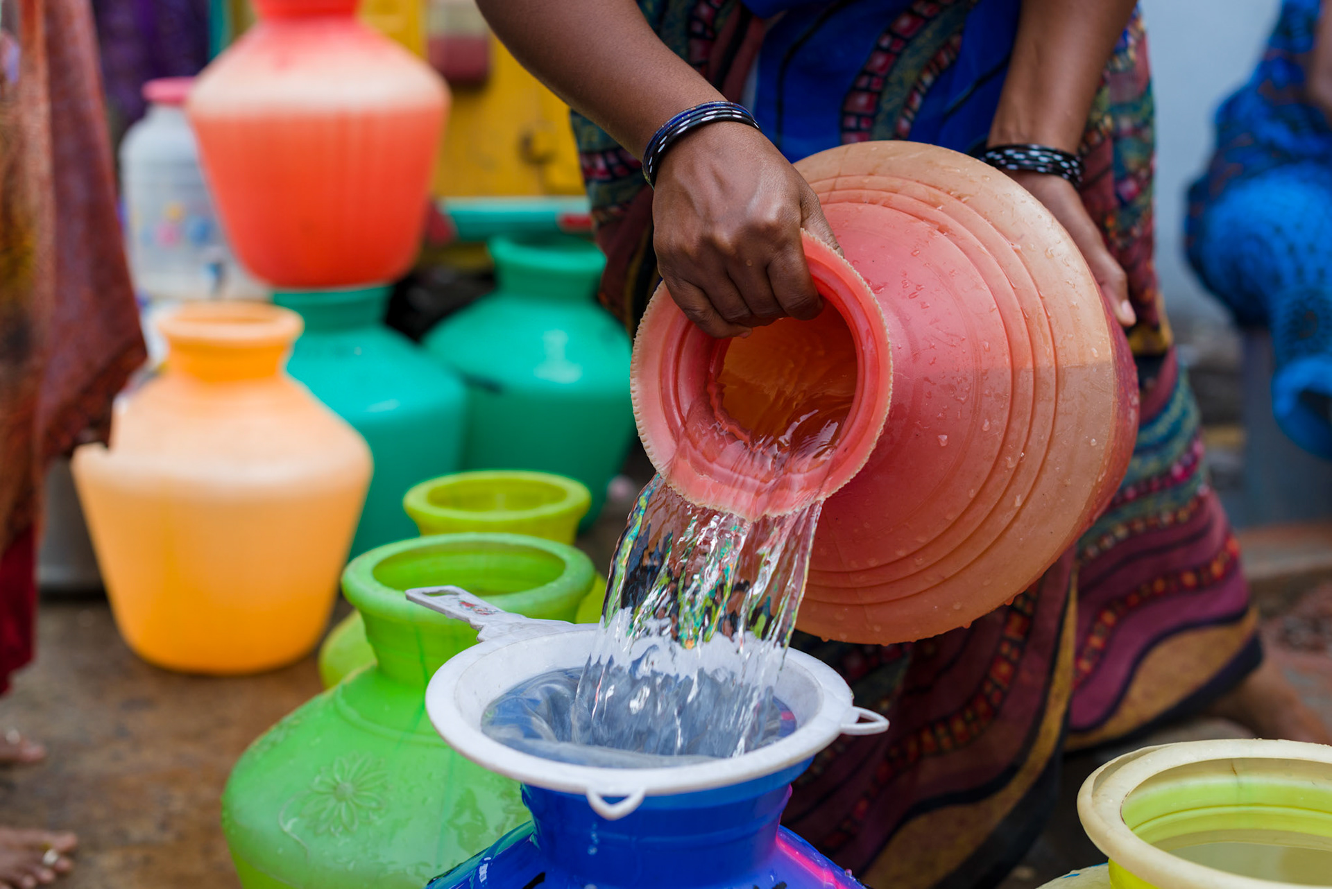 The water points only run from 5AM to 9AM, although the water pressure is not strong after 8AM, even for the hand-pumped points. Pallavan Nagar residents need to secure their day's water before it runs out.
The water comes from the Chennai water supply - bore water here is salty - and a water point has been provided for each four lanes in Pallavan Nagar