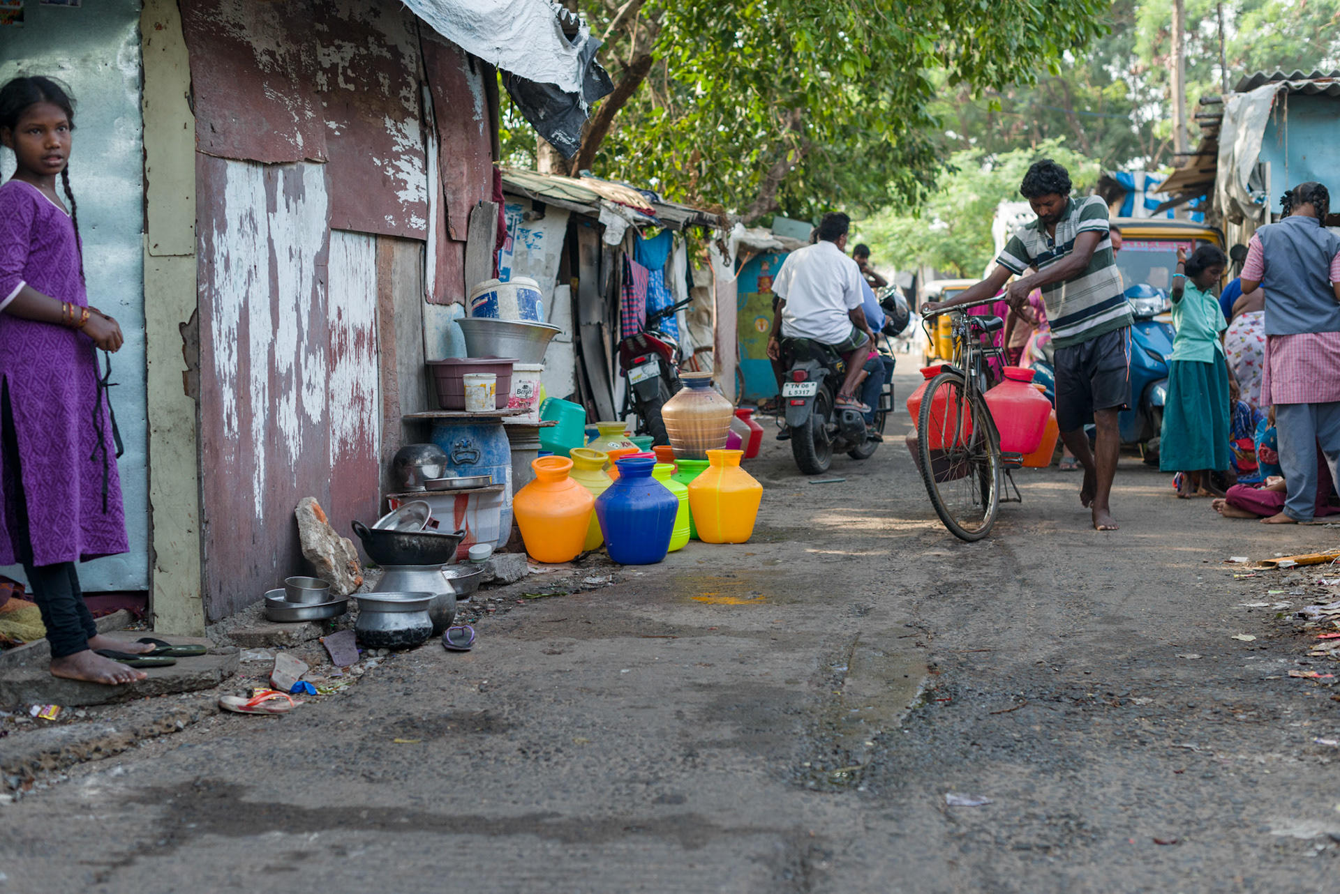 A street in Pallavan Nagar. The water points only run from 5AM to 9AM, although the water pressure is not strong after 8AM, even for the hand-pumped points. Pallavan Nagar residents need to secure their day's water before it runs out.
The water comes from the Chennai water supply - bore water here is salty - and a water point has been provided for each four lanes in Pallavan Nagar.