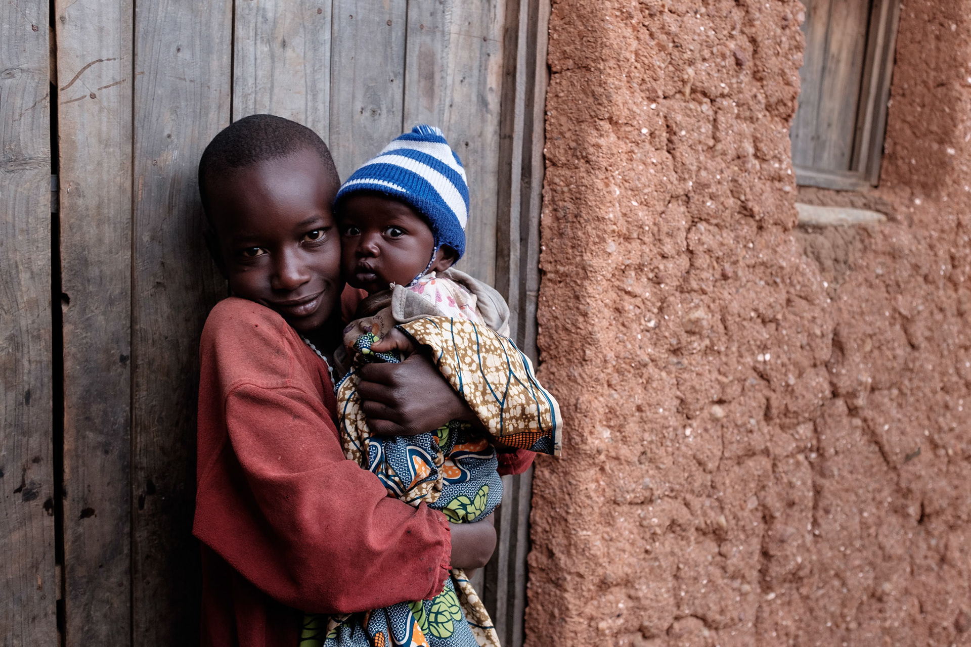Immaculate's daughter Denise looks after her youngest sister Clarisse.