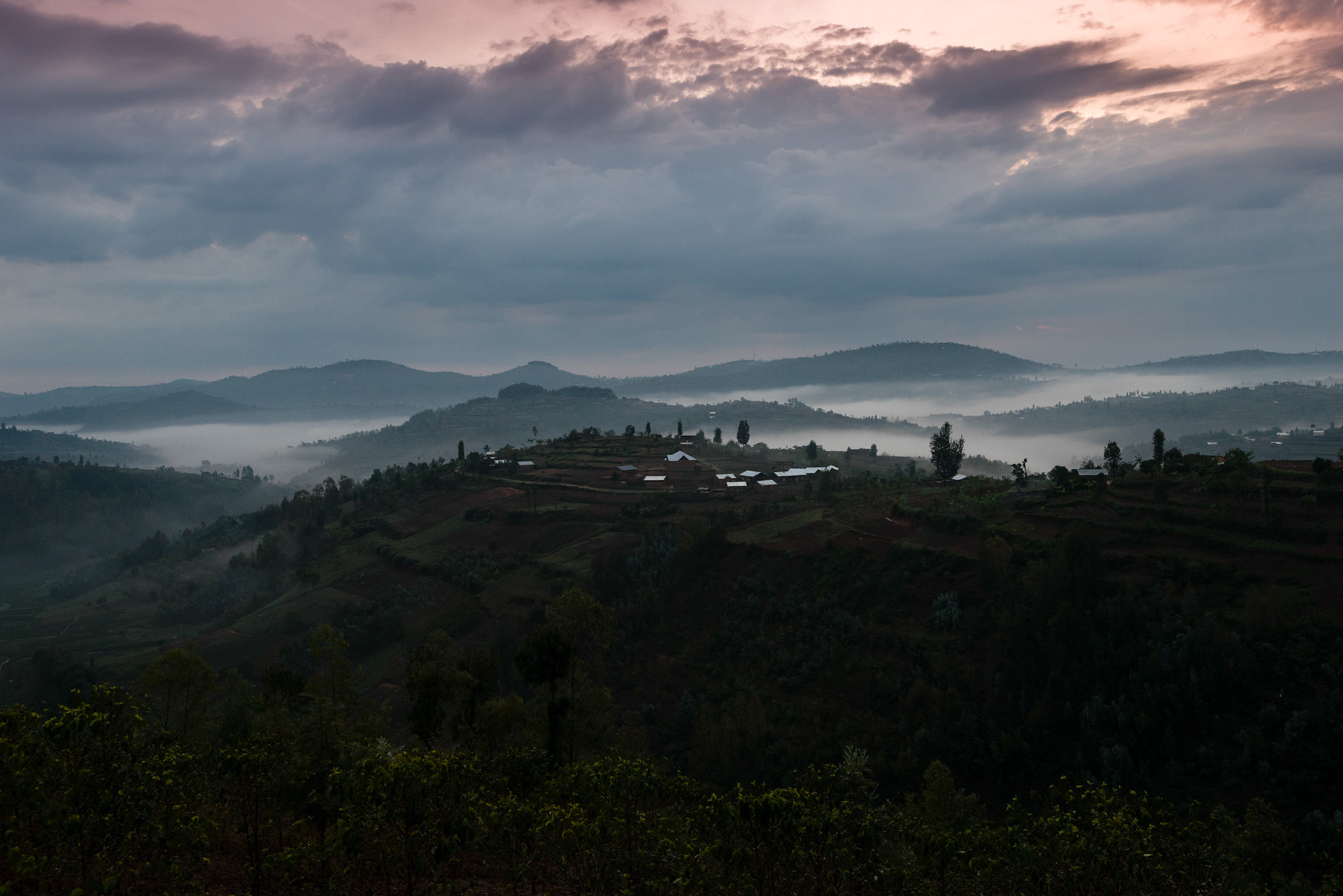 Kaesubuturanyi is in the hills of Rwanda's Southern Province. Early in the morning of the wet season, mists sit softly in the valley.