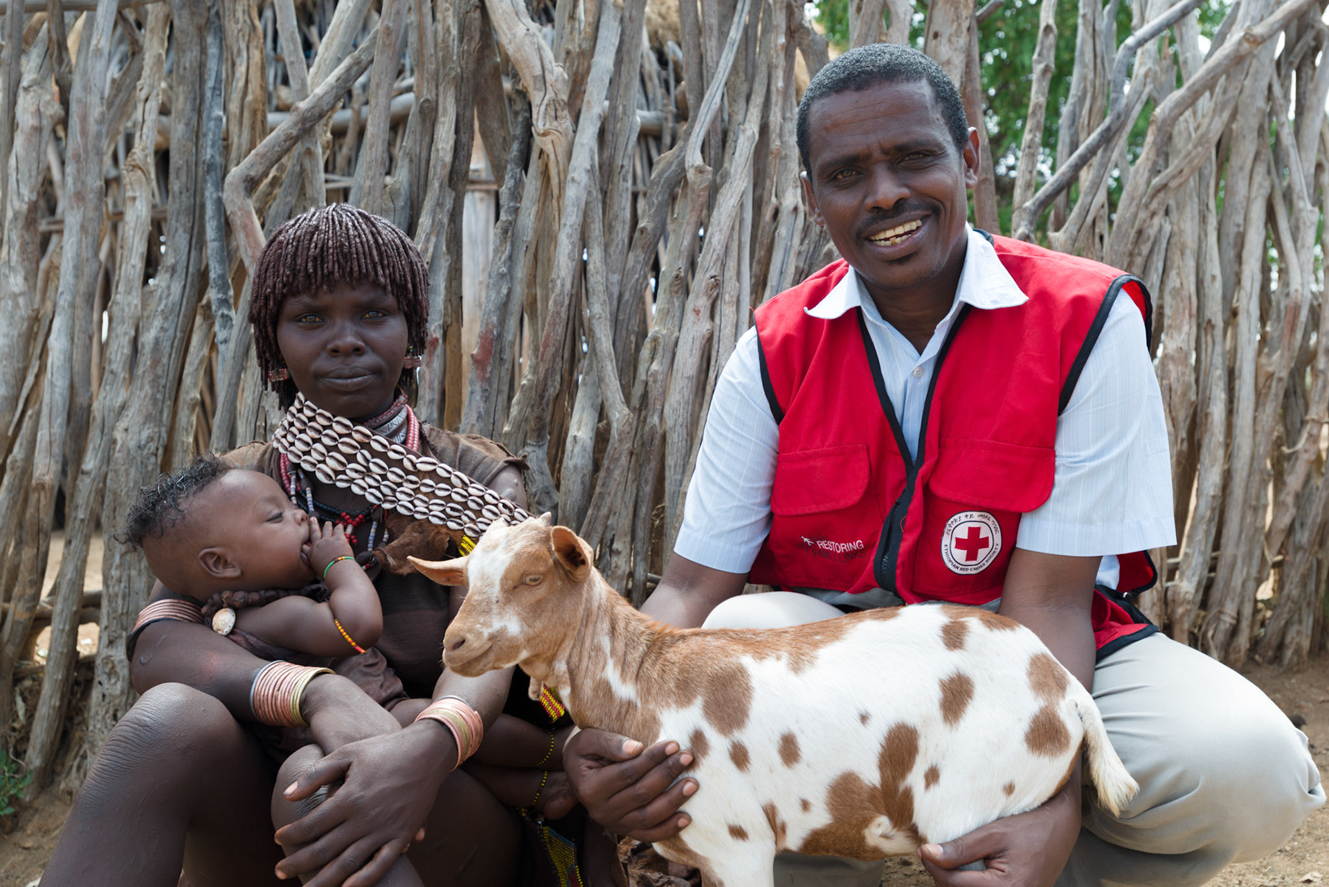 Tilahum Bishaw, the South Omo branch head, with Asile Hamer woman who has already received goats from the Austrian Red Cross goat distribution.
