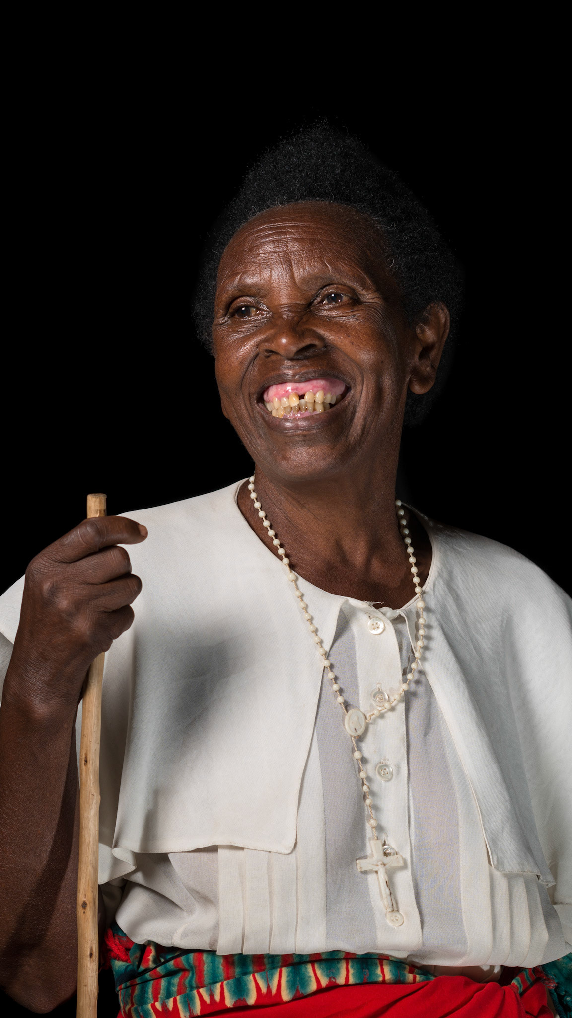 After her first year, Ancille sat for a portrait photo. In one year, she says that she is much happier, and now has support around her.