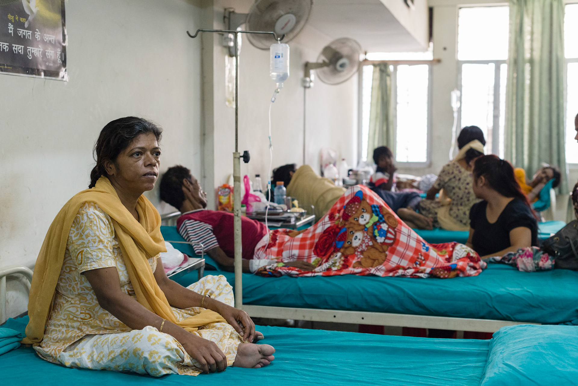 This patient is staying at the hospital while waiting for a place at a residential training program. She carries HIV, contracted from her late husband, and has been rejected by his family.