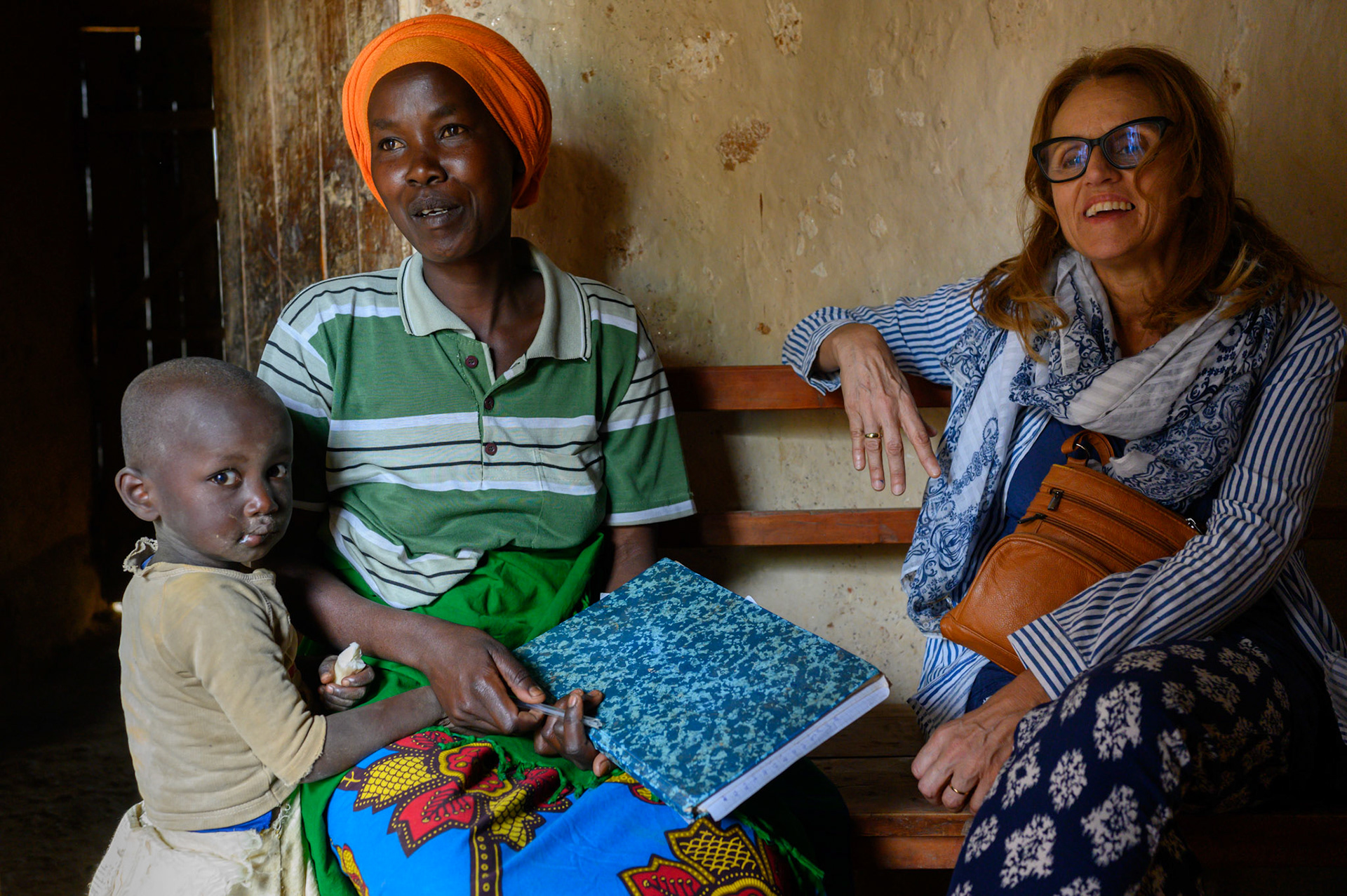 Immaculate and her youngest daughter Clarisse three years on from joiing her self-help group