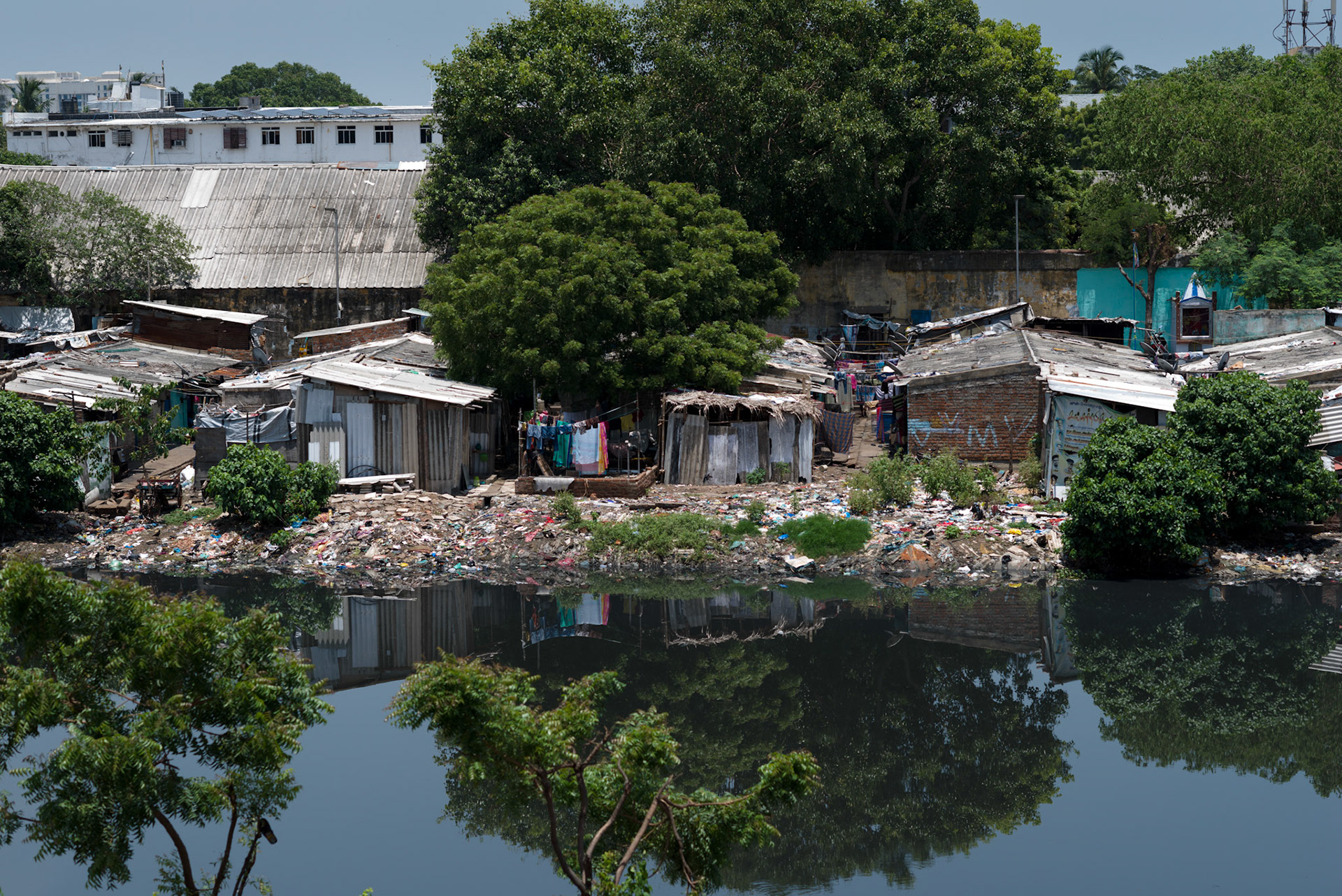 Pallavan Nagar slum seen from the railway station across the river.
A slum settlement like this is often a fitst step for pavement dwellers in Chennai. People living here at least have a permanent address and families can register for government services.
