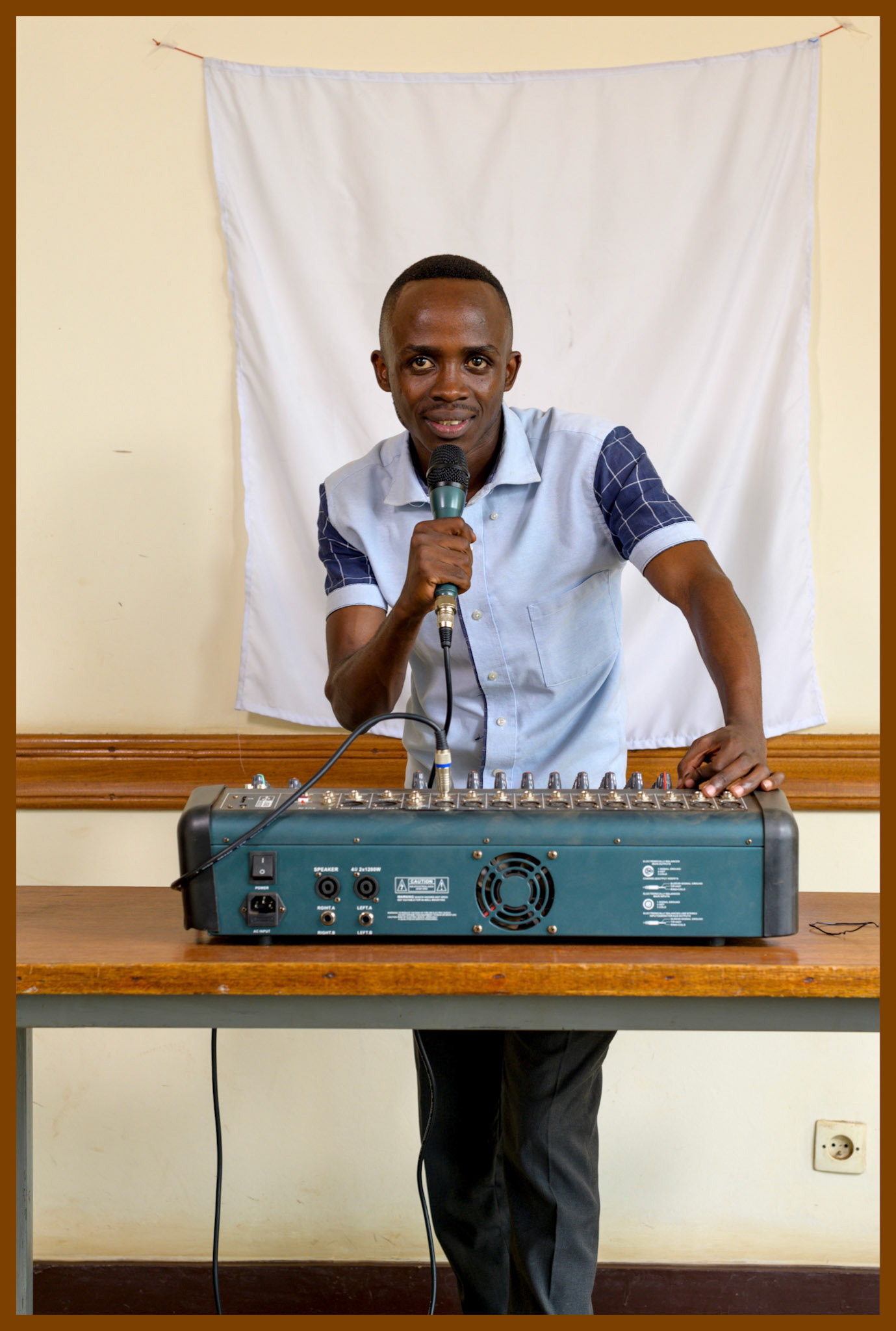 Emmanuel leads a youth cooperative. They have leased a sound system to rent out for community events and weddings, adding to their existng business ventures.