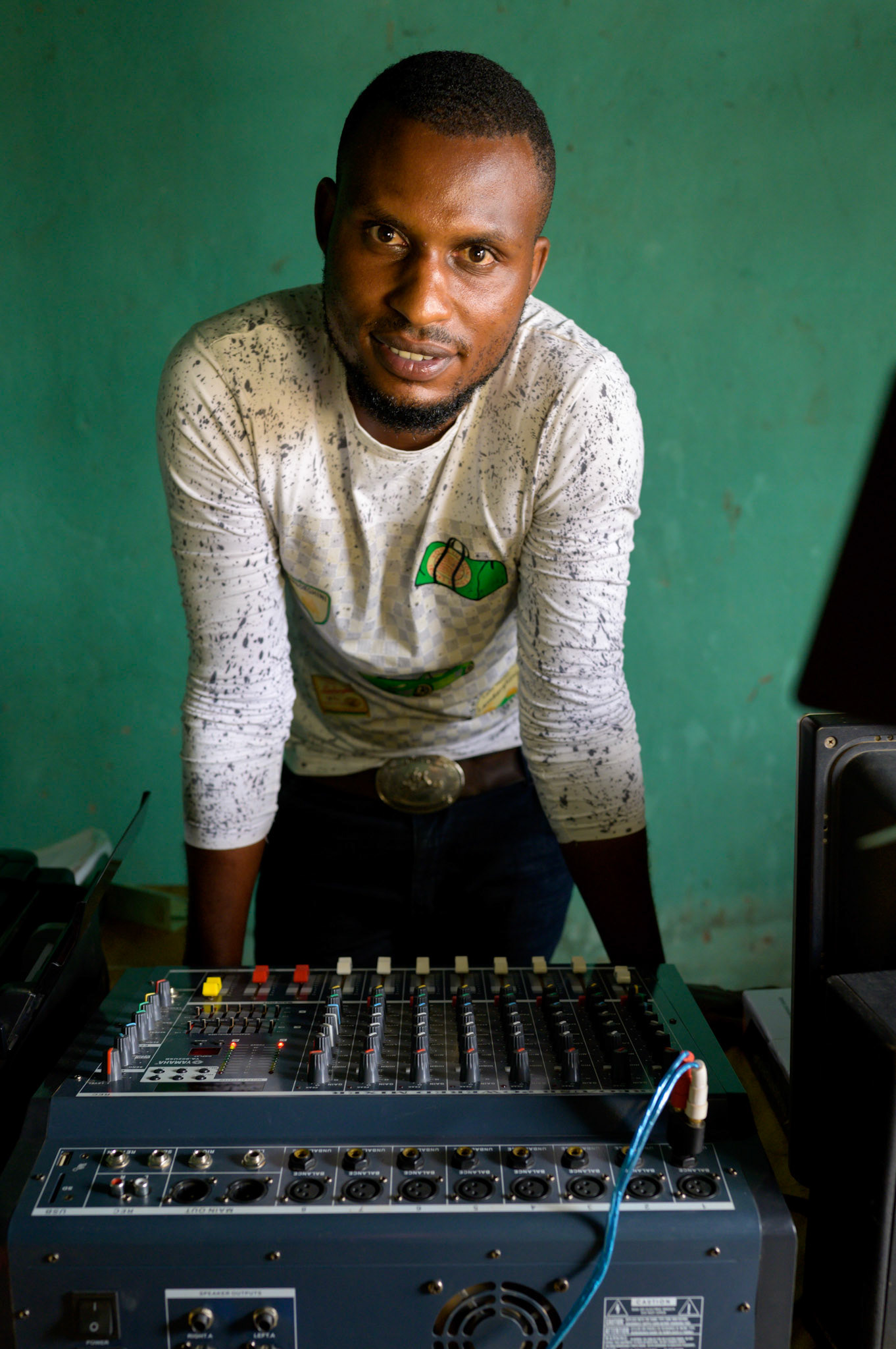 After completing a course in photograoby and design, Emmanuel decided to move to a small town near the Burundi border rather than compete in Kigali. He has leased a camera, lighting, latop, and sound system. He is the only person in the area to provide this capability for weddings and local events.
