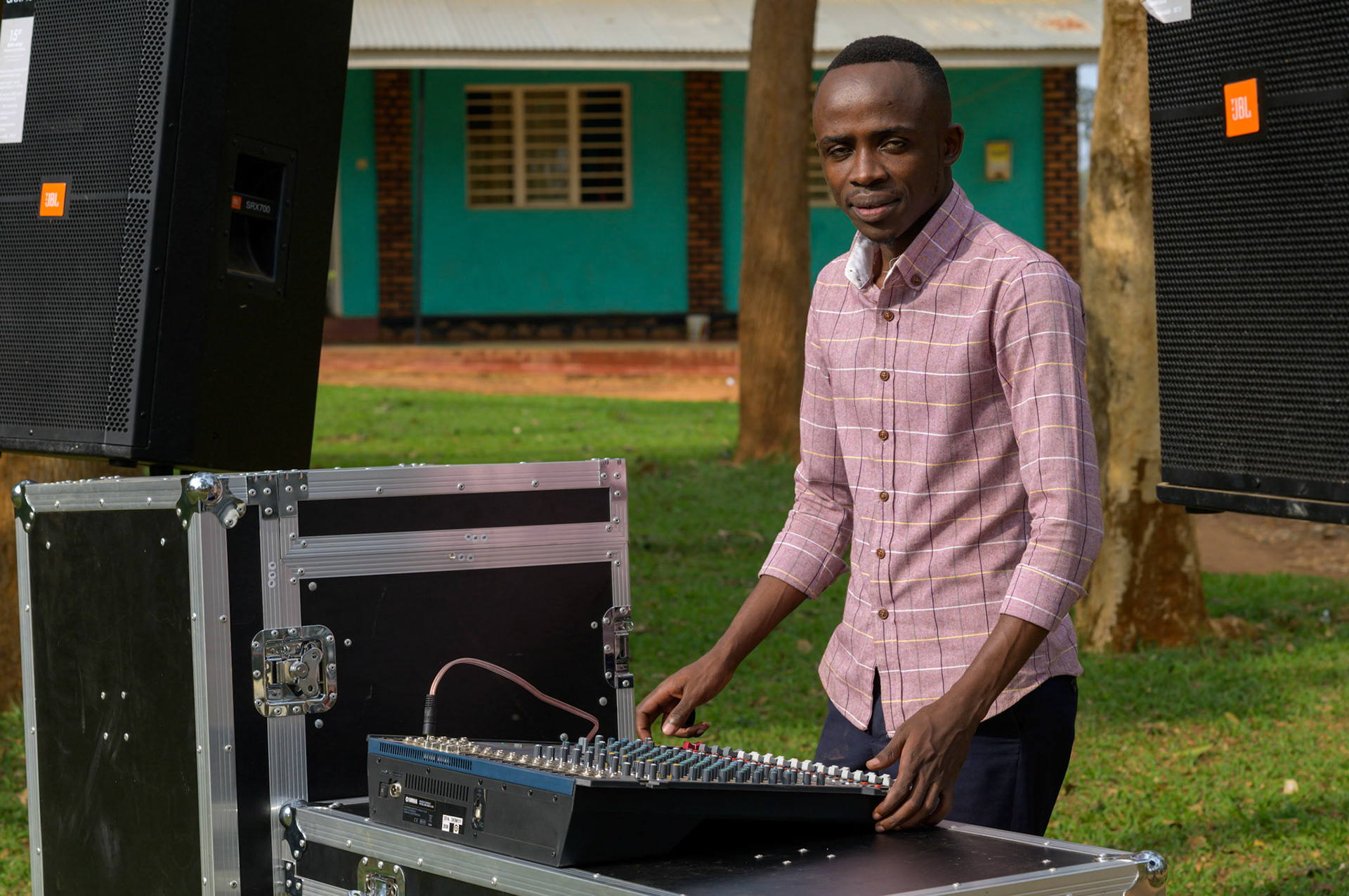 Emmanuel leads a youth cooperative. They have leased a sound system to rent out for community events and weddings, adding to their existng business ventures.